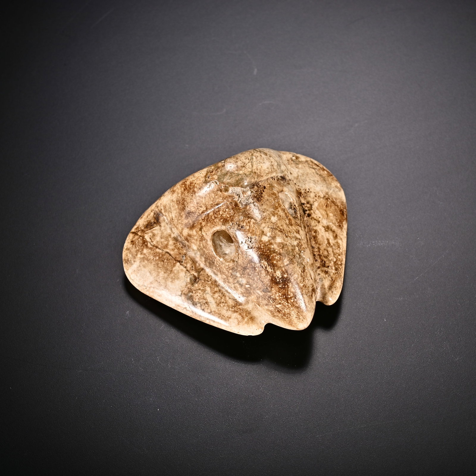 An Exquisite White Jade Ornament: An Exquisite White Jade Ornament Han Dynasty, China Size:2.1inx1.1in Weight:41g白玉摆件 中国汉代 Size:5.3cmx2.7cm Weight:41g