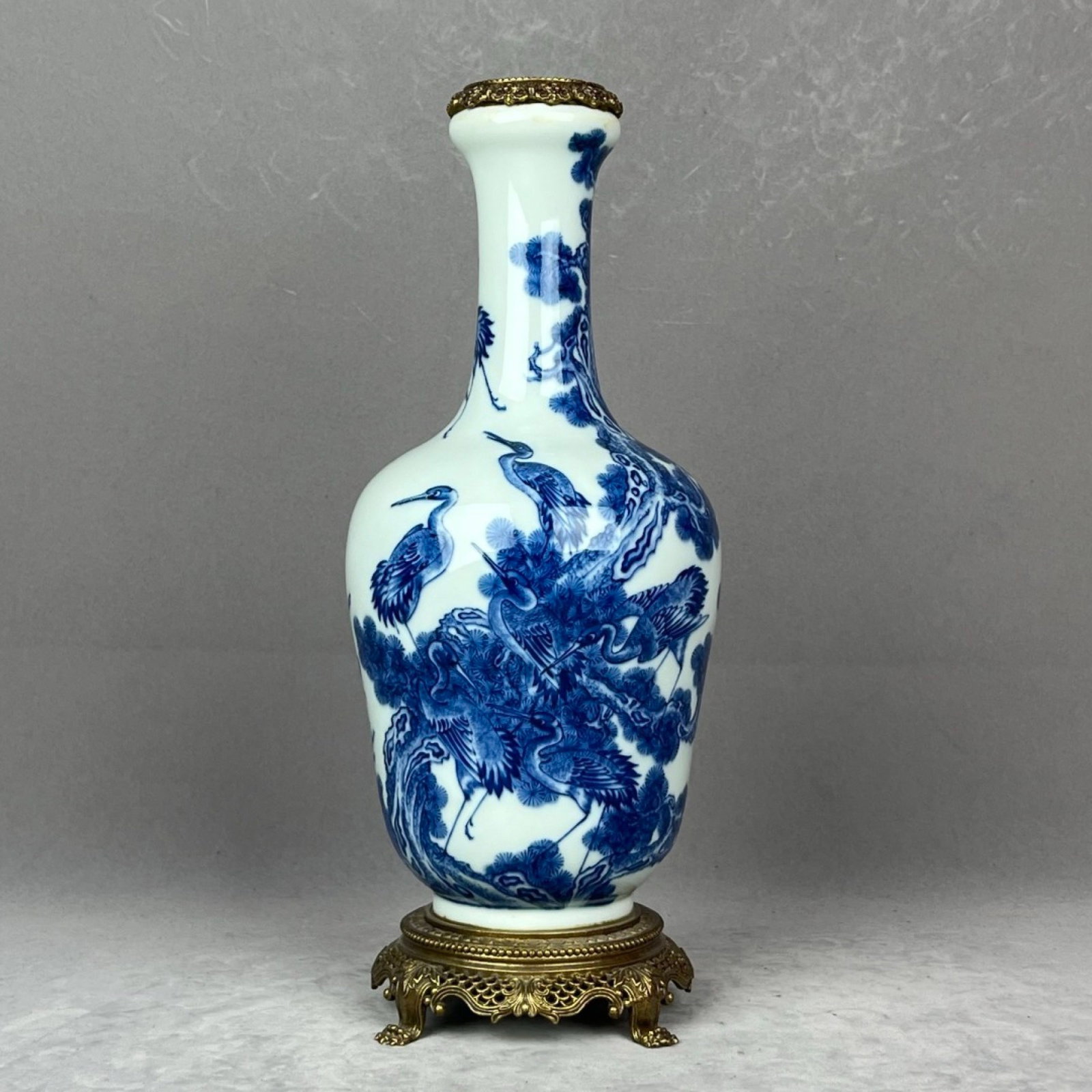 A Rare Blue and White Inlaid Bronze Pine and Crane Pattern Vase: A Rare Blue and White Inlaid Bronze Pine and Crane Pattern Vase,Qing Dynasty,China,Yongzheng Six-character Mark,Size:13.4inx2.6inx5.1inx4.7in 青花镶铜松鹤纹&#