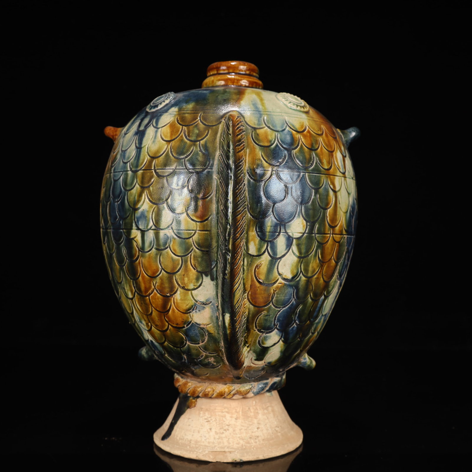 An Exquisite Tang Tri-Color Glazed Pottery Fish-Shaped Vase: An Exquisite Tang Tri-Color Glazed Pottery Fish-Shaped Vase,Tang Dynasty, China,Size:6.7inx7.9inx10.2in,Weight:1800g 唐三彩鱼形瓶，中国唐