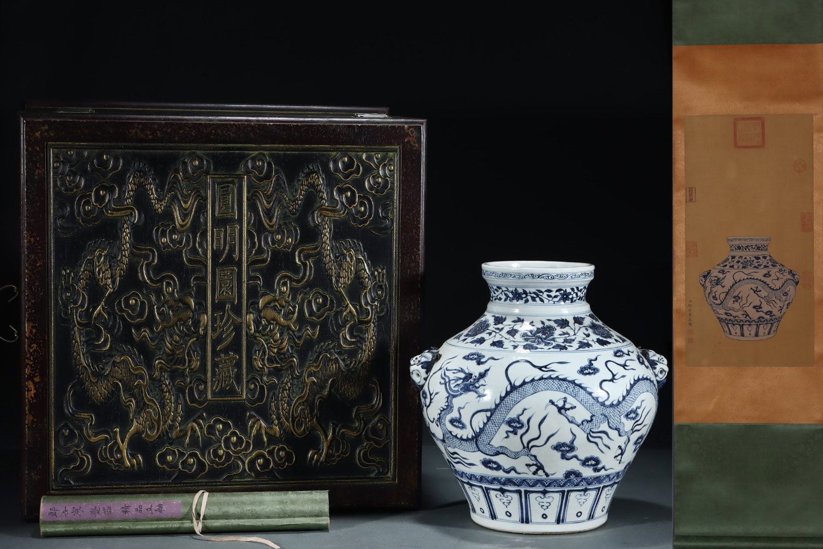 A Rare Blue and White Lotus?Auspicious Cloud and Dragon Pattern Beast-Ears Jar,With Vertical: A Rare Blue and White Lotus，Auspicious Cloud and Dragon Pattern Beast-Ears Jar,With Vertical Scroll Painting on Silk,Yuan Dynasty, China,Size:14.2inx14in,(Without frame)24.4inx12.6in 青&#