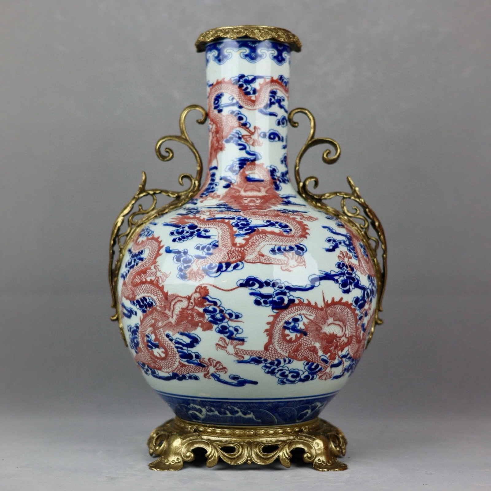 A Huge Blue and White Underglaze-Red Inlaid Bronze Auspicious Cloud and Dragon Pattern Double-Ears: A Huge Blue and White Underglaze-Red Inlaid Bronze Auspicious Cloud and Dragon Pattern Double-Ears Vase,Qing Dynasty,China,Qianlong Six-character Mark,Size:16.9inx4.1inx9.8inx7.1in 青花