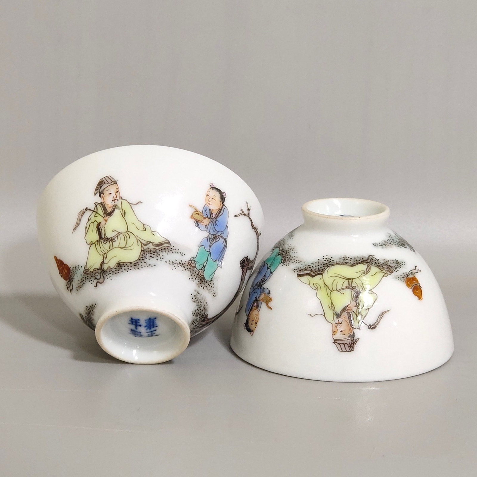 A Pair of Exquisite Famille-Rose Character and Story Pattern Cups: A Pair of Exquisite Famille-Rose Character and Story Pattern Cups,Qing Dynasty,China,Yongzheng Four-character Mark,Size:1.4inx2.2in 一对粉彩人物故事 