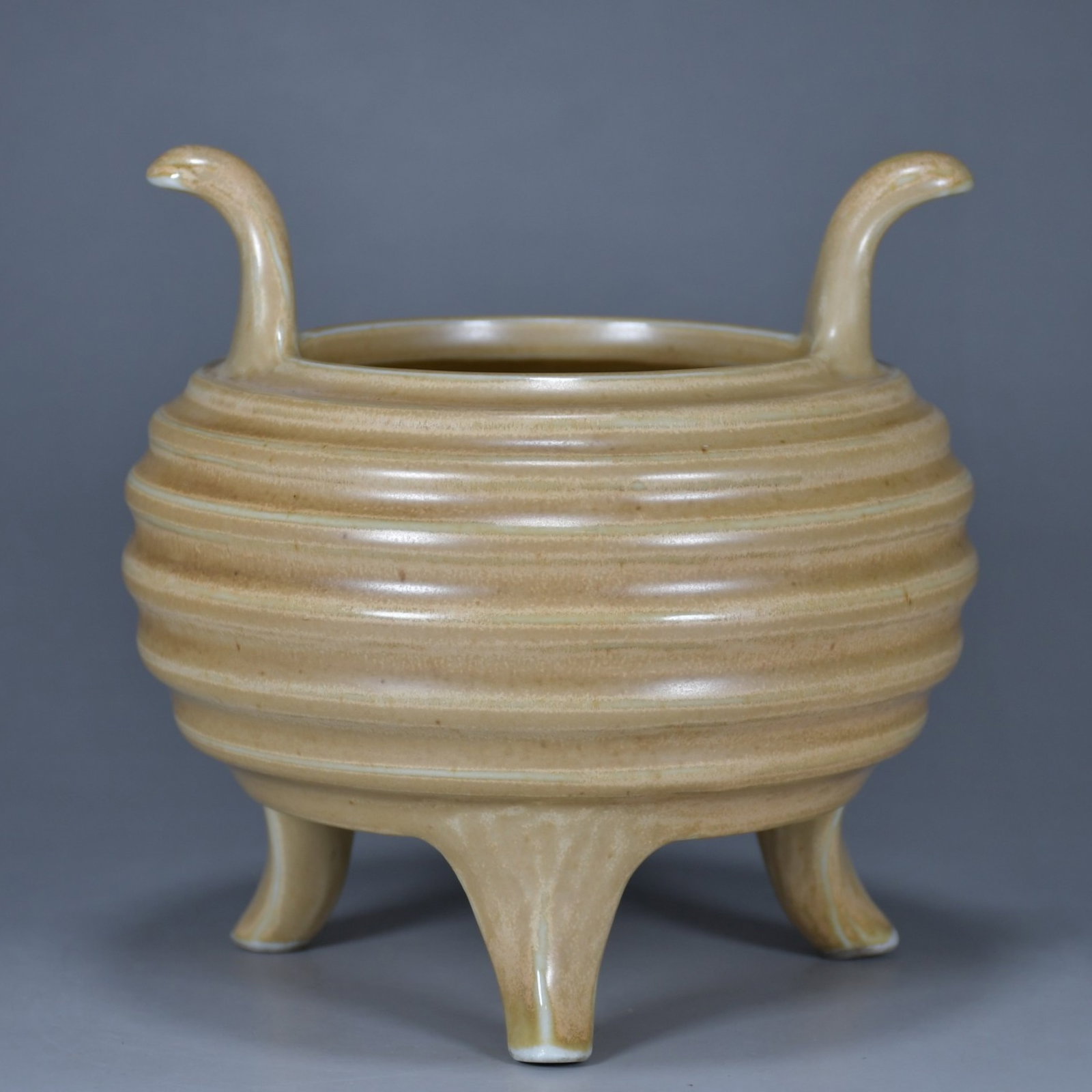 An Exquisite Yellow Glazed Double-Ears Tripod Censer: An Exquisite Yellow Glazed Double-Ears Tripod Censer,Qing Dynasty,China,Qianlong Four-character Mark,Size:5.9inx5.9in 黄釉双耳三足香炉,中国&
