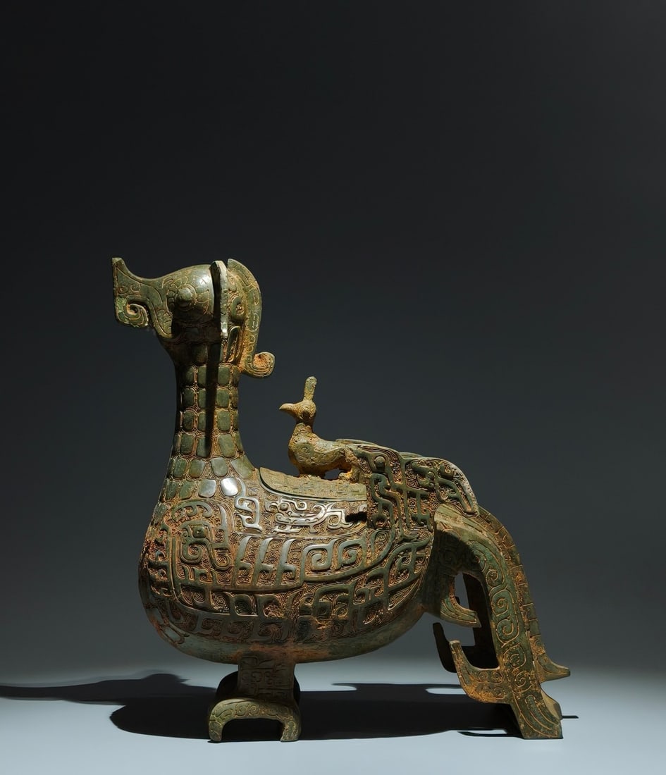 An Archaic Bronze Phoenix Pattern Bird-Shaped Food Vessel: An Archaic Bronze Phoenix Pattern Bird-Shaped Food Vessel,W.Zhou,China,Size:14.2inx14.2inx5.5in 青铜凤纹鸟形食器,中国西周时