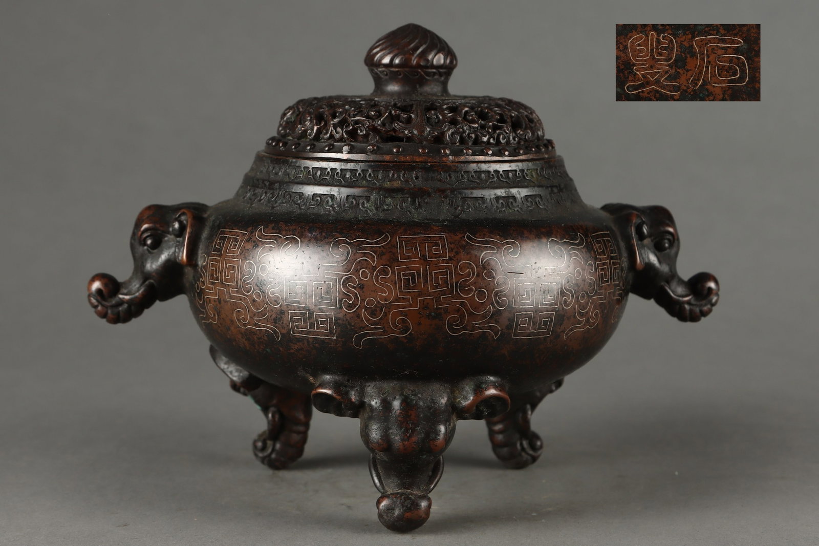 An Exquisite Bronze Inlaid Silver Beast-Face Pattern Elephant-Ears Tripod Censer: An Exquisite Bronze Inlaid Silver Beast-Face Pattern Elephant-Ears Tripod Censer,Ming Dynasty,China,With Mark,Size:5.9inx3.7inx5.5inx7.9in,Weight:2450g 铜错银兽面纹