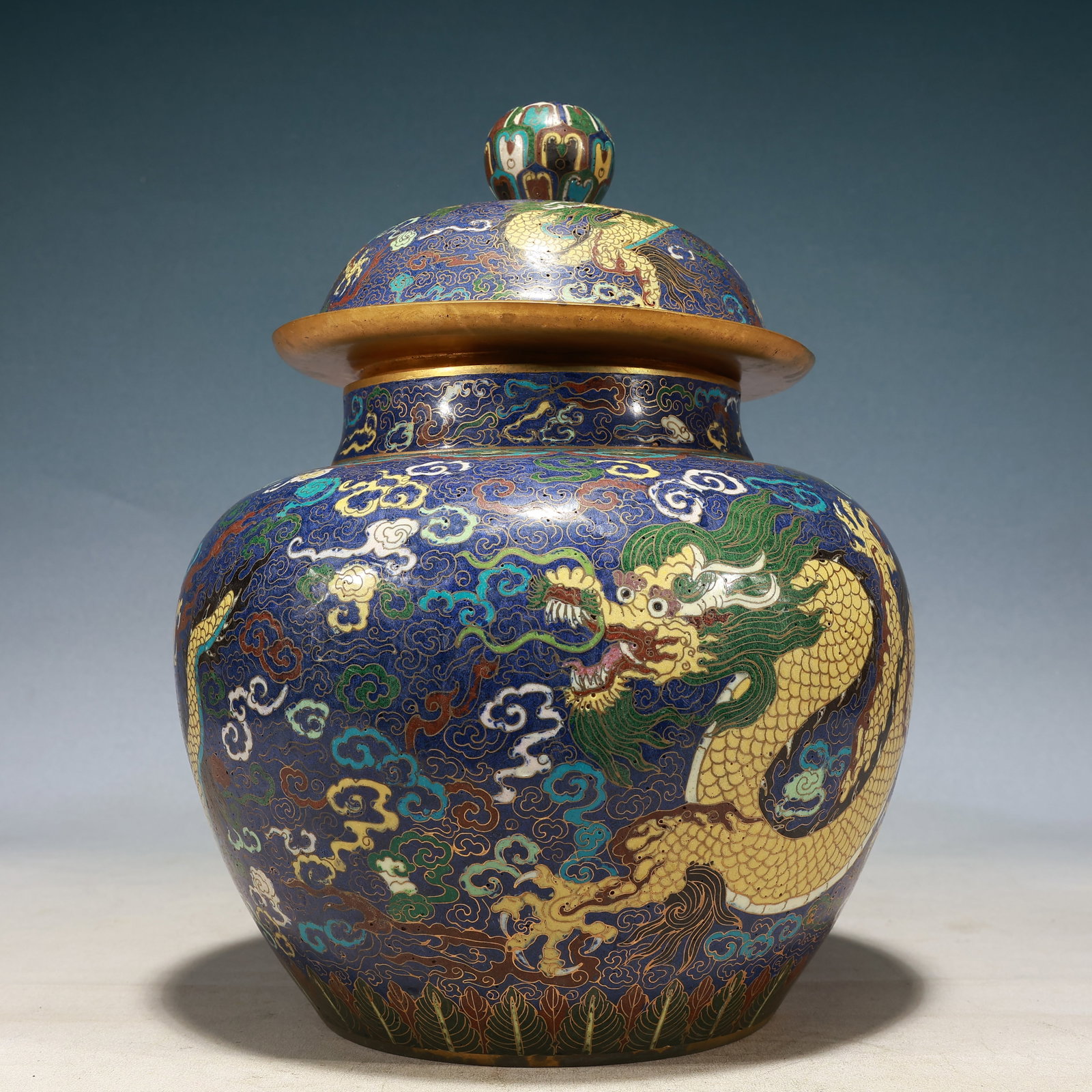 A Rare Cloisonne Auspicious Cloud and Dragon Pattern Jar with Cover: A Rare Cloisonne Auspicious Cloud and Dragon Pattern Jar with Cover,Ming Dynasty, China,Xuande Four-character Mark,Size:9.1inx13.8in,Weight:4800g 景泰蓝祥云龙ಬ