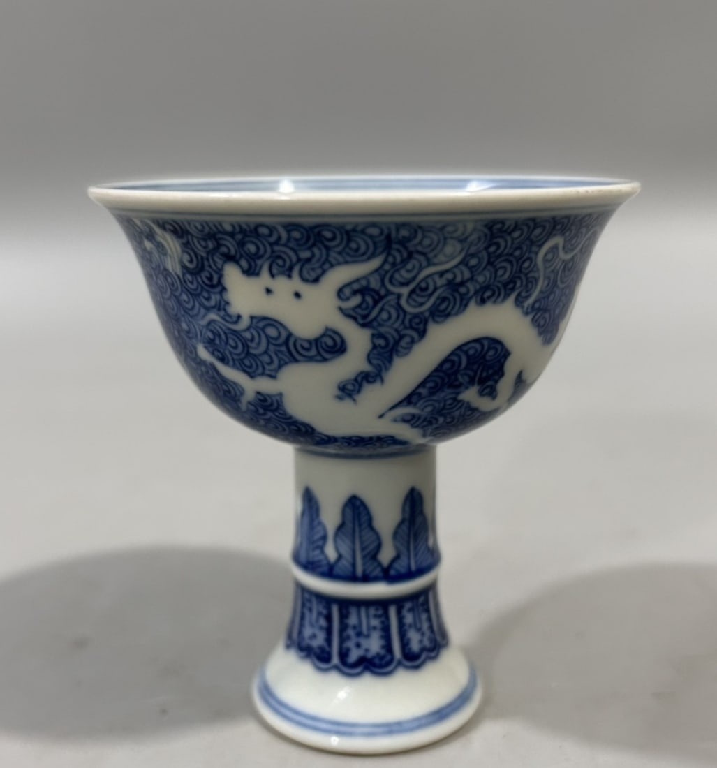 An Exquisite Blue and White Seawater and Dragon Pattern Stem Cup: An Exquisite Blue and White Seawater and Dragon Pattern Stem Cup,Qing Dynasty,China,Yongzheng Six-character Mark,Size:3.3inx3.1in 青花海水龙纹高足੗
