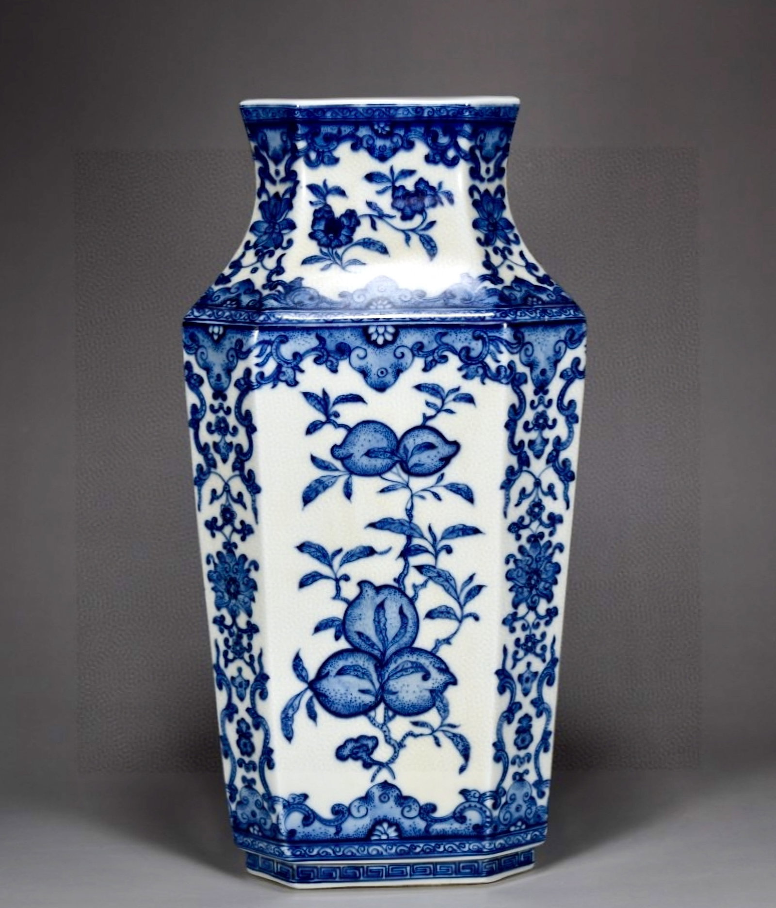 A Rare Guan yao Blue and White Lotus and Fruit Pattern Vase: A Rare Guan yao Blue and White Lotus and Fruit Pattern Vase,Qing Dynasty,China,Qianlong Six-character Mark,Size:13.8inx7.5in 官窑青花缠枝莲果纹