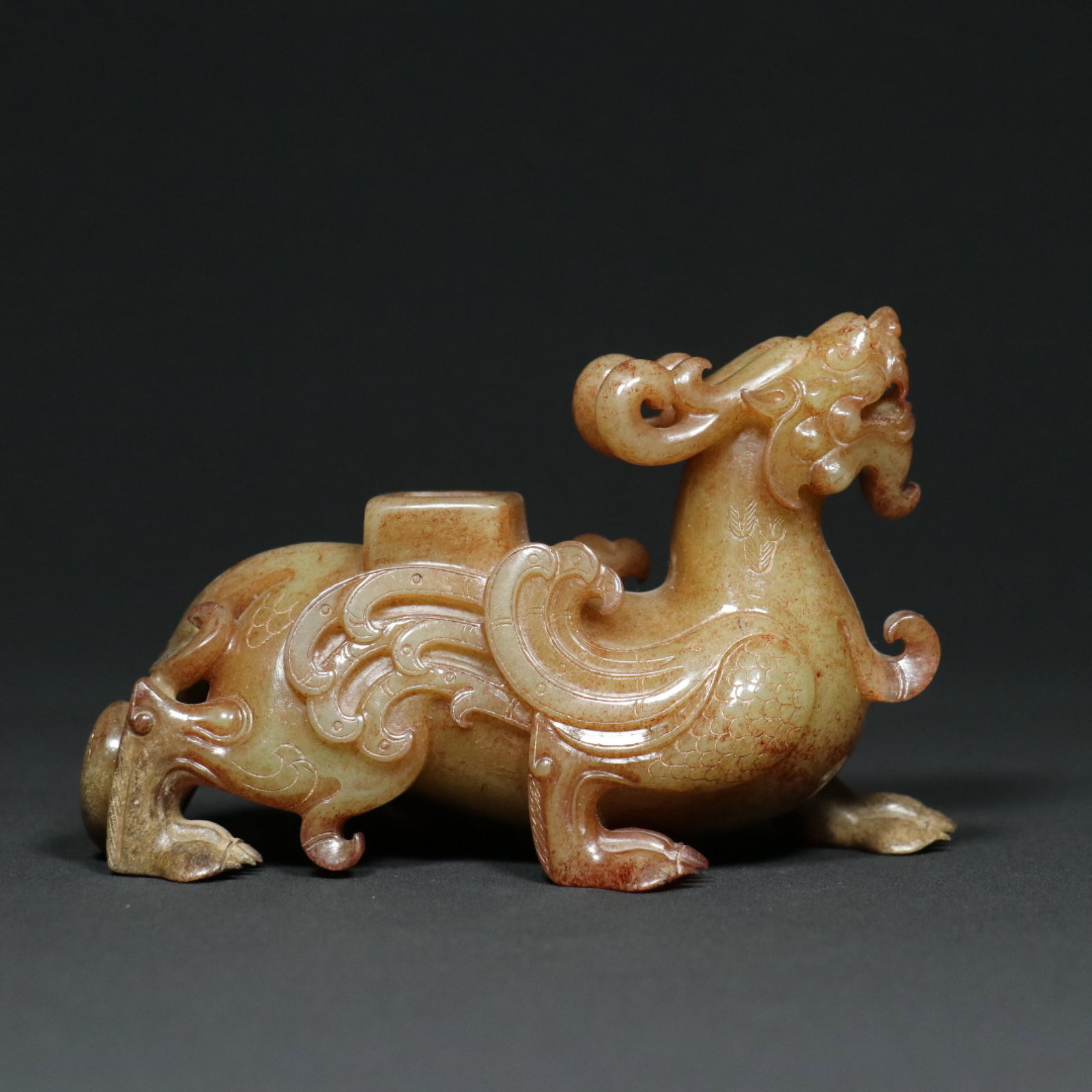 An Exquisite White Jade Auspicious Beast Ornament: An Exquisite White Jade Auspicious Beast Ornament,Qing Dynasty,China,Size:5.3inx2.6inx3.3in,Weight:537g 白玉瑞兽摆件,中国清代