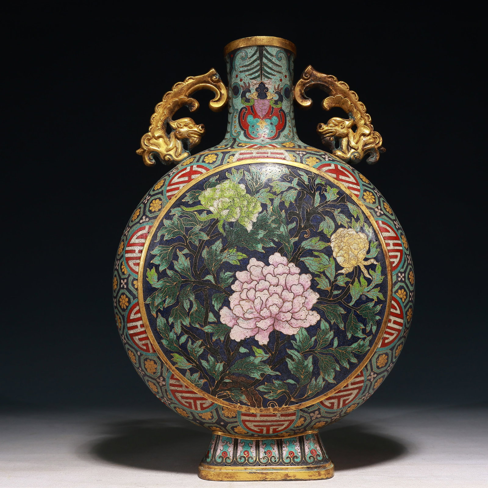 An Exquisite Cloisonne Flower Pattern Dragon-Ears Vase: An Exquisite Cloisonne Flower Pattern Dragon-Ears Vase,Qing Dynasty,China,Qianlong Four-character Mark,Size:9.4inx4.3inx11in,Weight:3250g 景泰蓝花卉纹龙೑