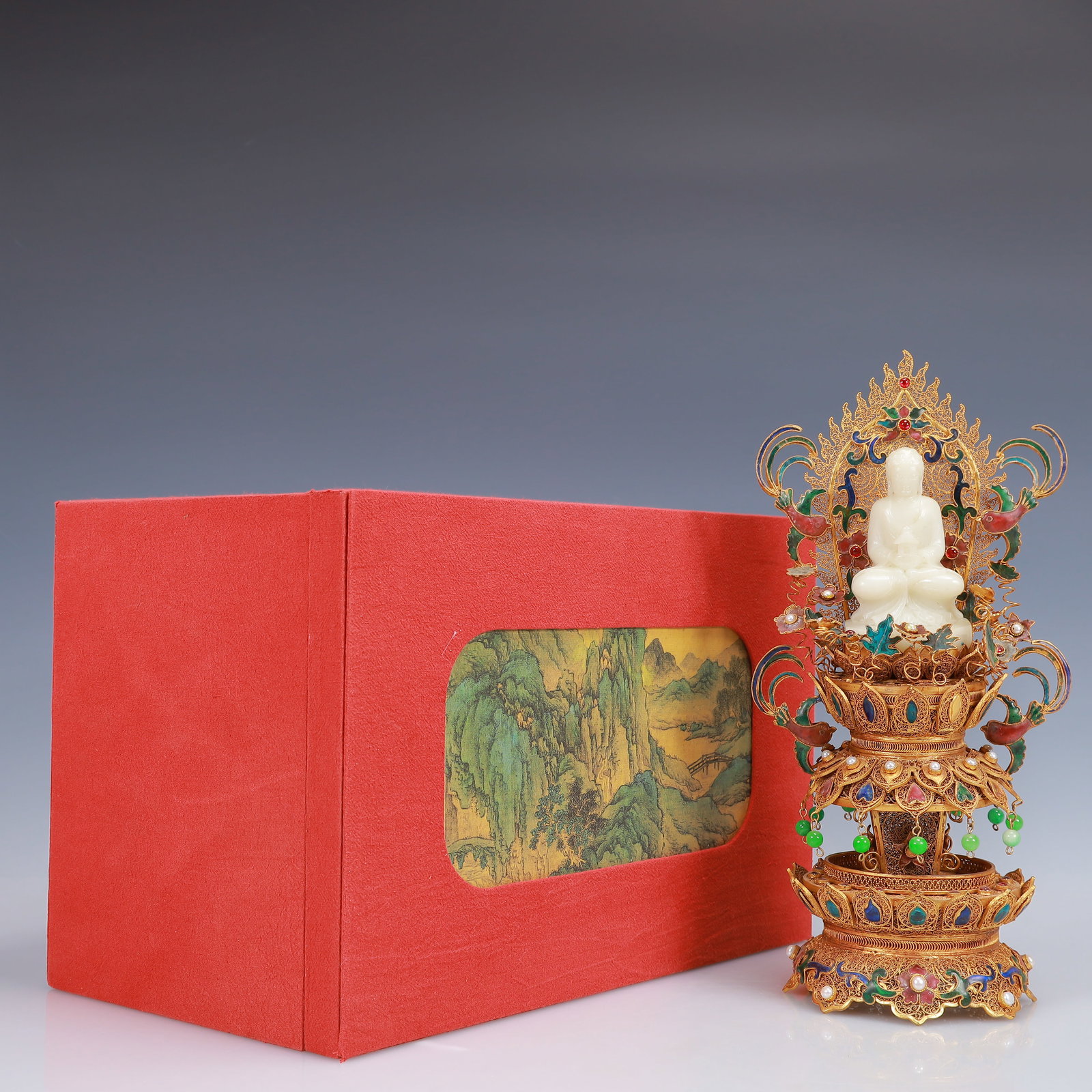 An Exquisite Filigree and Gilding Inlaid White Jade Buddha Statue,Inlaid Gems: An Exquisite Filigree and Gilding Inlaid White Jade Buddha Statue,Inlaid Gems,Qing Dynasty, China,Qianlong Four-Character Mark,Size:6.3inx4.7inx11.8in,(Box)13.8inx9.1inx8.3in,Weight:1100g 花