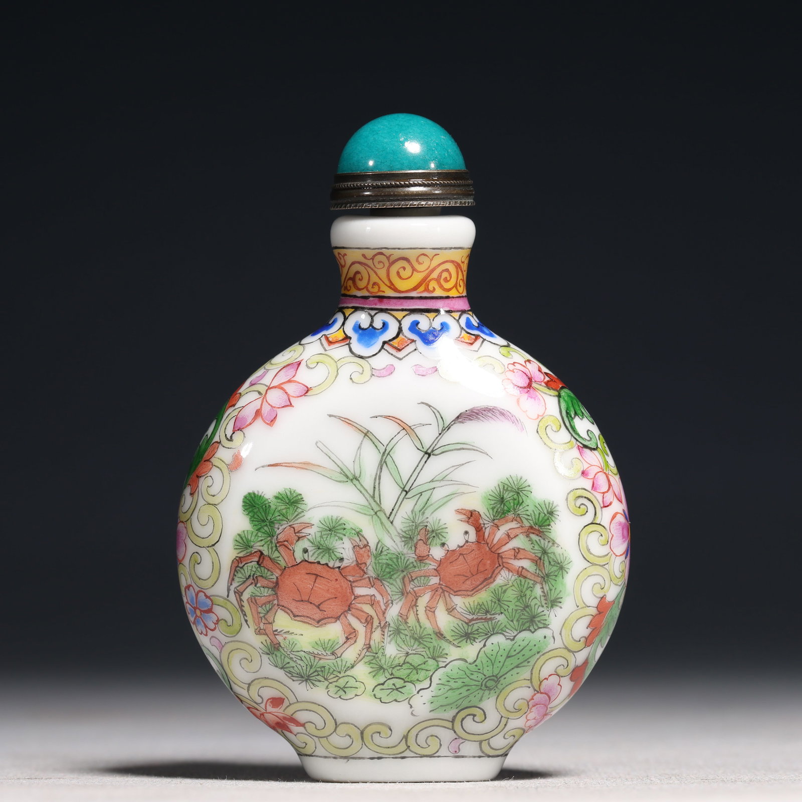 An Exquisite Painted Enamel Lotus and Crab Pattern Porcelain Snuff Bottle: An Exquisite Painted Enamel Lotus and Crab Pattern Porcelain Snuff Bottle,Qing Dynasty,China,Daoguang Four-character Mark,Size:2.2inx0.8inx3.1in 瓷胎画珐琅彩莲