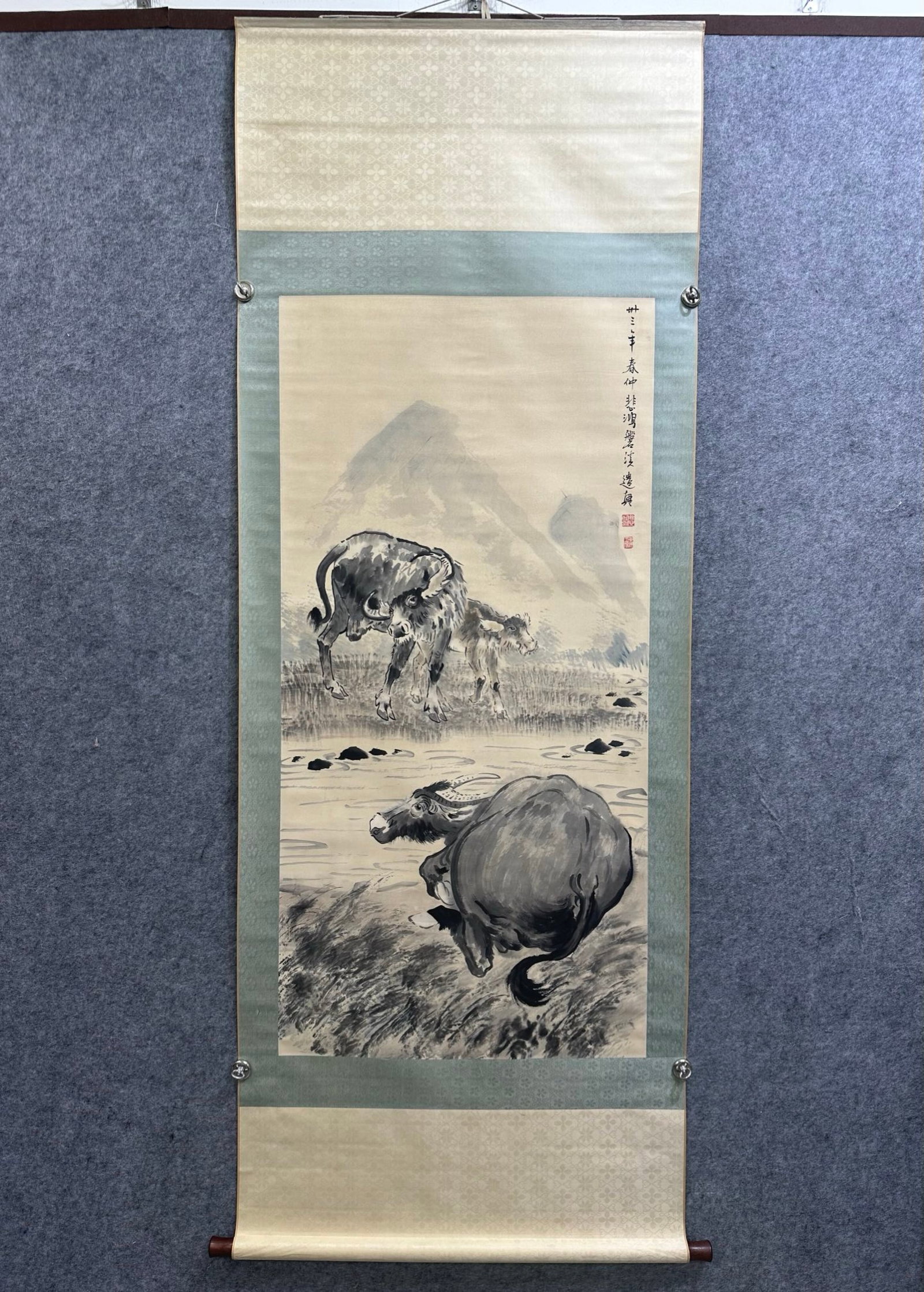 A Chinese Vertical Scroll Ink Painting of Buffalo on Paper,Xu Beihong: A Chinese Vertical Scroll Ink Painting of Buffalo on Paper,Xu Beihong,Size:(Without frame)26.4inx54.3in 一幅中国水墨牛图立轴,徐悲