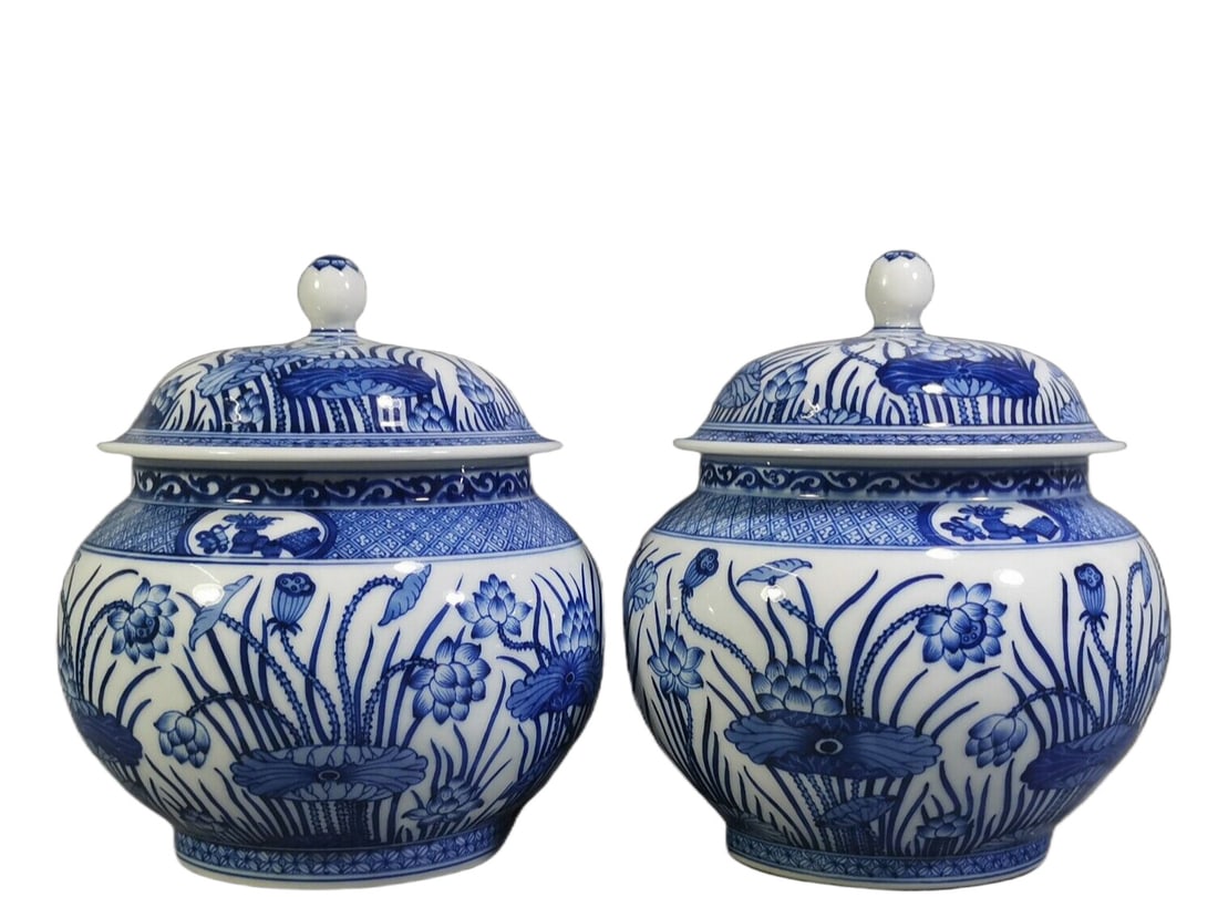 A Pair of Exquisite Blue and White Lotus Pattern Tea Caddys: A Pair of Exquisite Blue and White Lotus Pattern Tea Caddys,Qing Dynasty, China,Qianlong Six-character Mark,Size:9.4inx5.9in 一对青花荷花纹茶叶