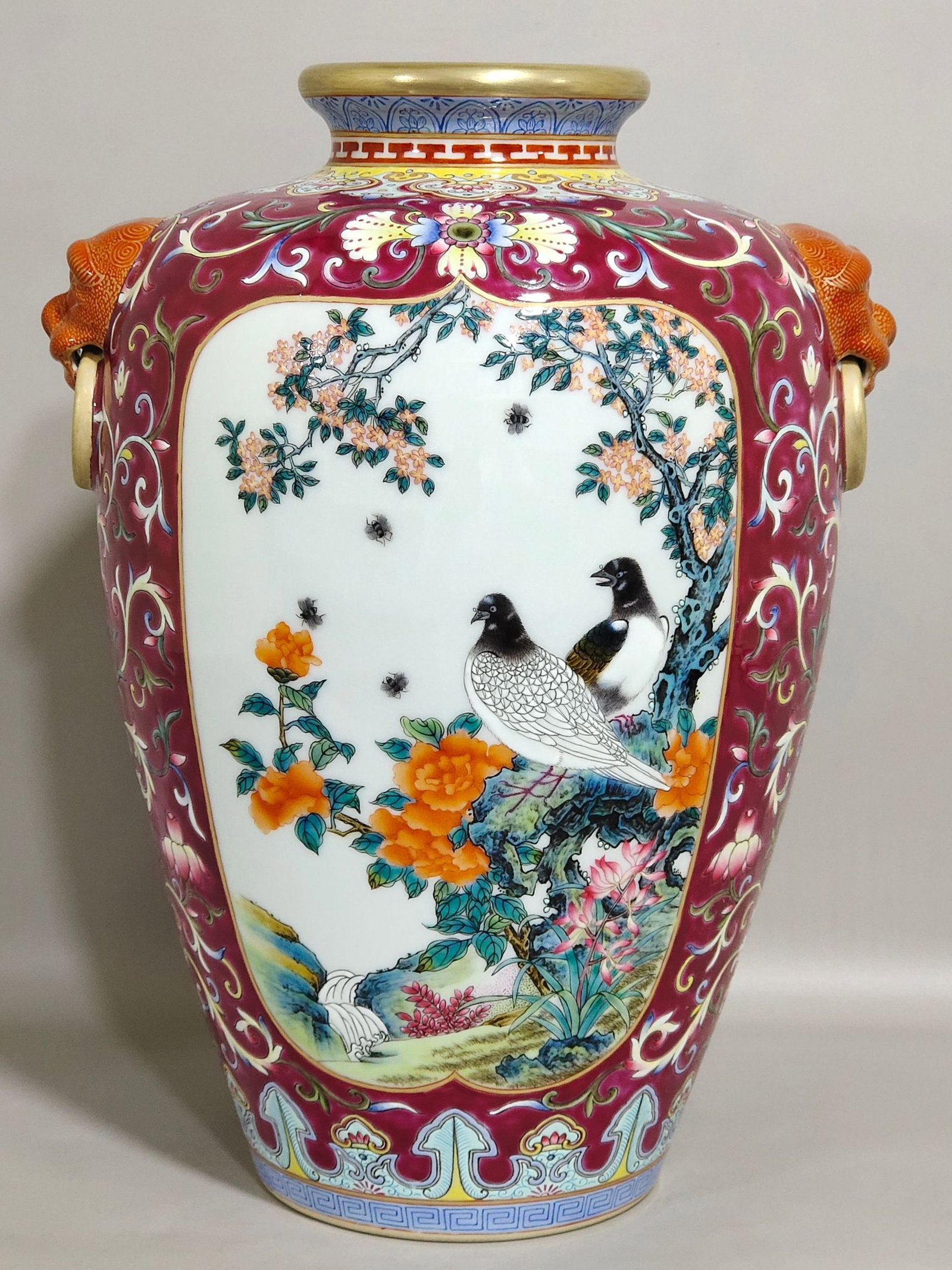 An Exquisite Famille-Rose Ruby Red-Ground Painted Gold Flower and Bird Pattern Beast-Ears Vase: An Exquisite Famille-Rose Ruby Red-Ground Painted Gold Flower and Bird Pattern Beast-Ears Vase,Qing Dynasty,China,Qianlong Six-character Mark,Size:10.6inx7.5in 粉彩胭脂红