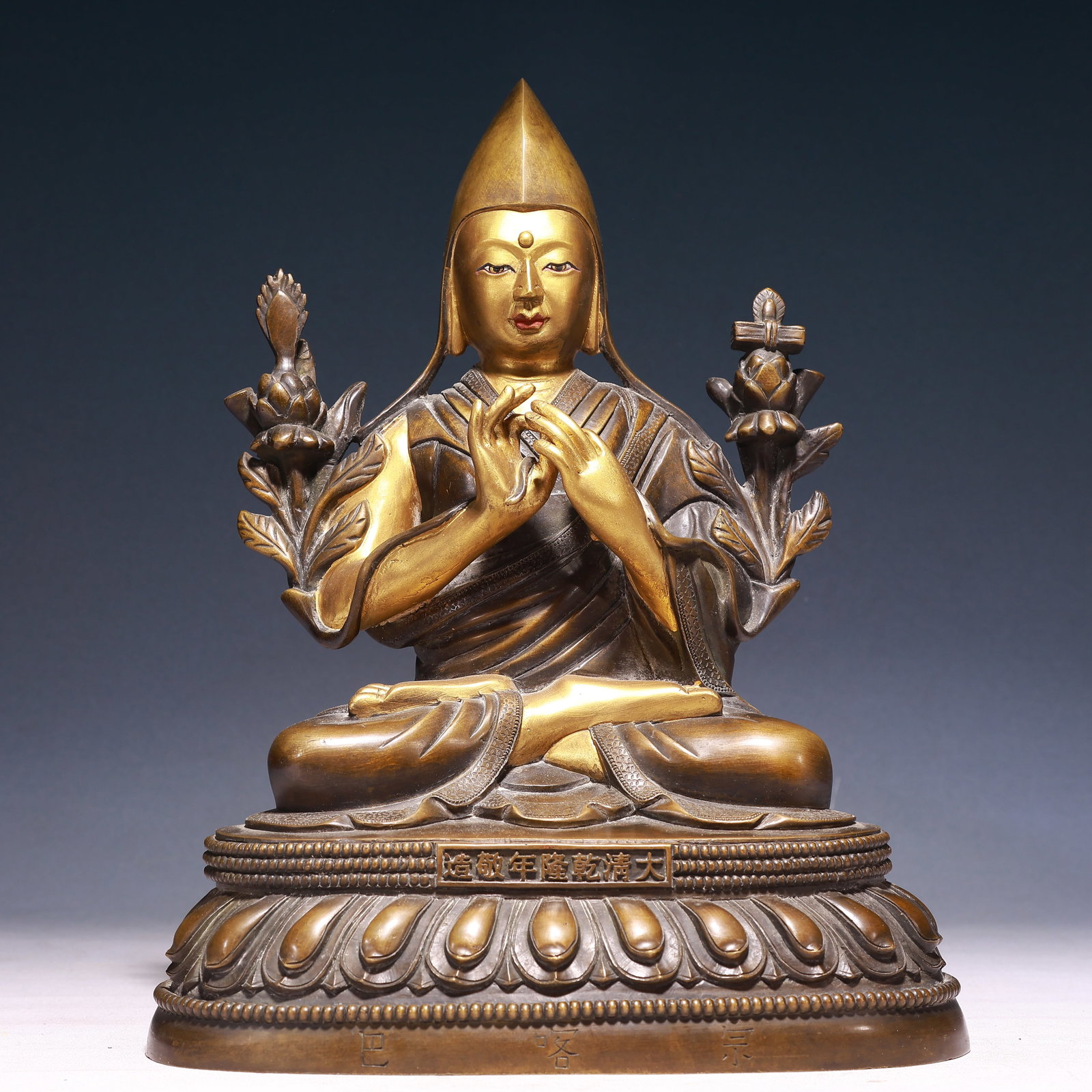 A Solemn Gilt Bronze Statue of Tsongkhapa: A Solemn Gilt Bronze Statue of Tsongkhapa,Qing Dynasty,China,Qianlong Mark,Size:10.6inx7.9inx14.2in,Weight:9400g 铜鎏金宗喀巴像,中国清ߣ