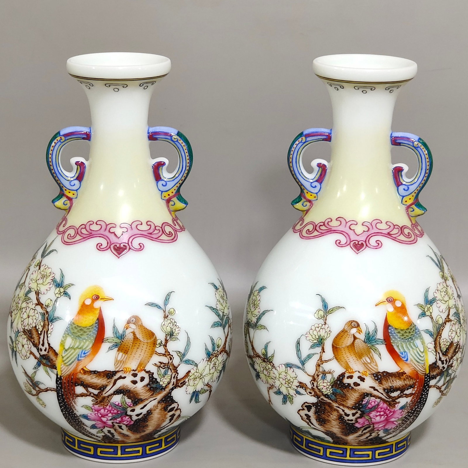 A Pair of Exquisite Enamel Flower and Bird Pattern Double-Ears Vases,With Poem: A Pair of Exquisite Enamel Flower and Bird Pattern Double-Ears Vases,With Poem,Qing Dynasty,China,Qianlong Four-character Mark,Size:6.4inx3.8in 一对珐琅彩花鸟