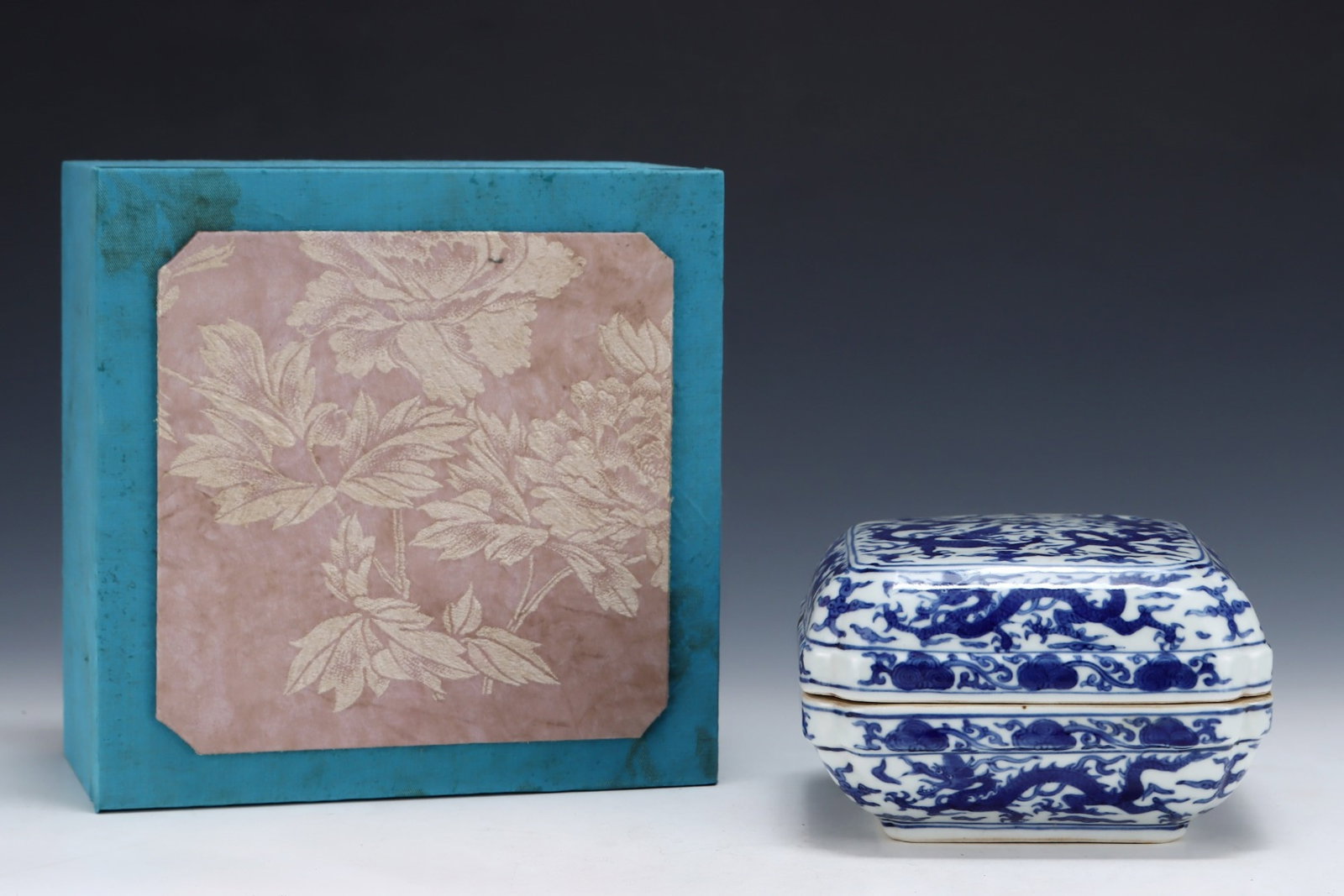 An Exquisite Blue and White Auspicious Cloud and Dragon Pattern Box with Cover: An Exquisite Blue and White Auspicious Cloud and Dragon Pattern Box with Cover,Ming Dynasty,China,Jiajing Six-character Mark,Size:3.9inx6.3in 青花祥云龙纹盖&#