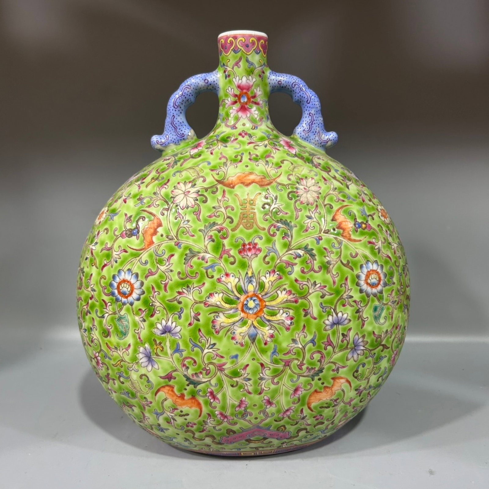 An Exquisite Famille-Rose Lotus,Bats and Peach Pattern Double-Ears Vase: An Exquisite Famille-Rose Lotus,Bats and Peach Pattern Double-Ears Vase,Qing Dynasty,China,Yongzheng Six-character Mark,Size:7.9inx11.2in 粉彩缠枝莲福寿ಬ