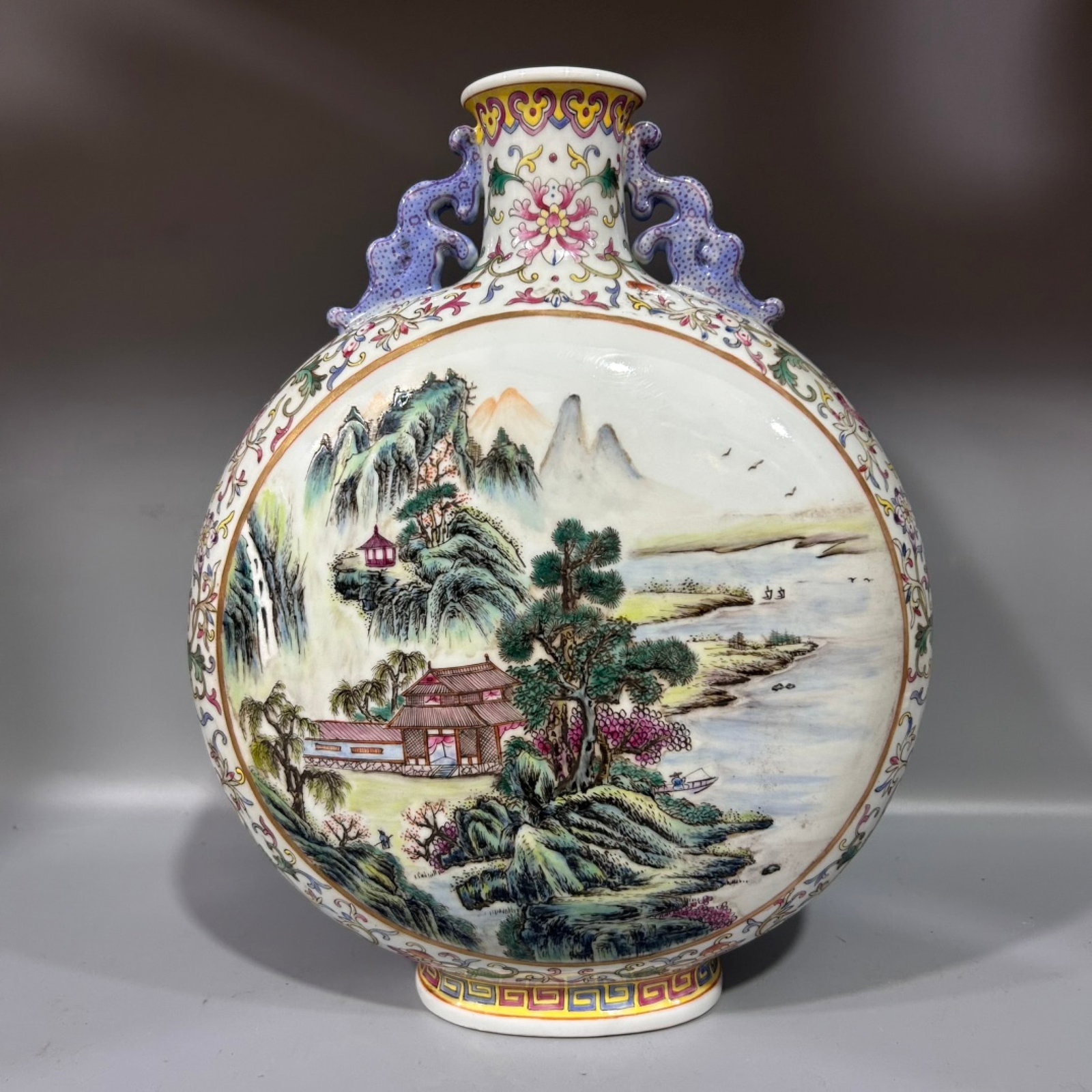 A Rare Famille-Rose Landscape and Figure Pattern Dragon-Ears Vase: A Rare Famille-Rose Landscape and Figure Pattern Dragon-Ears Vase,Qing Dynasty,China,Qianlong Six-character Mark,Size:9.1inx12.4in 粉彩山水人物纹龙ň