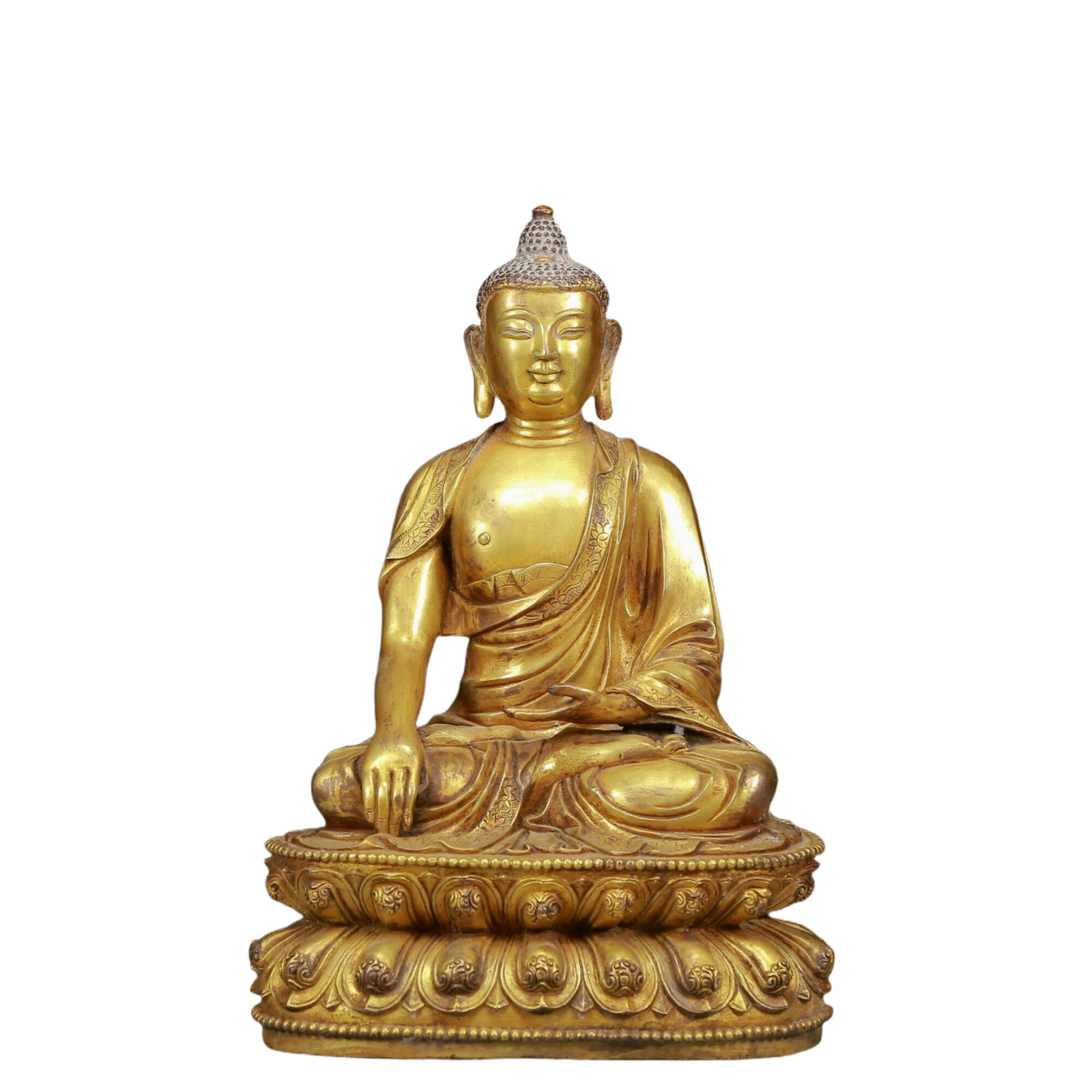 A Solemn Gilt Bronze Statue of Sakyamuni: A Solemn Gilt Bronze Statue of Sakyamuni,Ming Dynasty, China,Size:8.3inx5.9inx12.6in,Weight:5945g 铜鎏金释迦摩尼像，明代