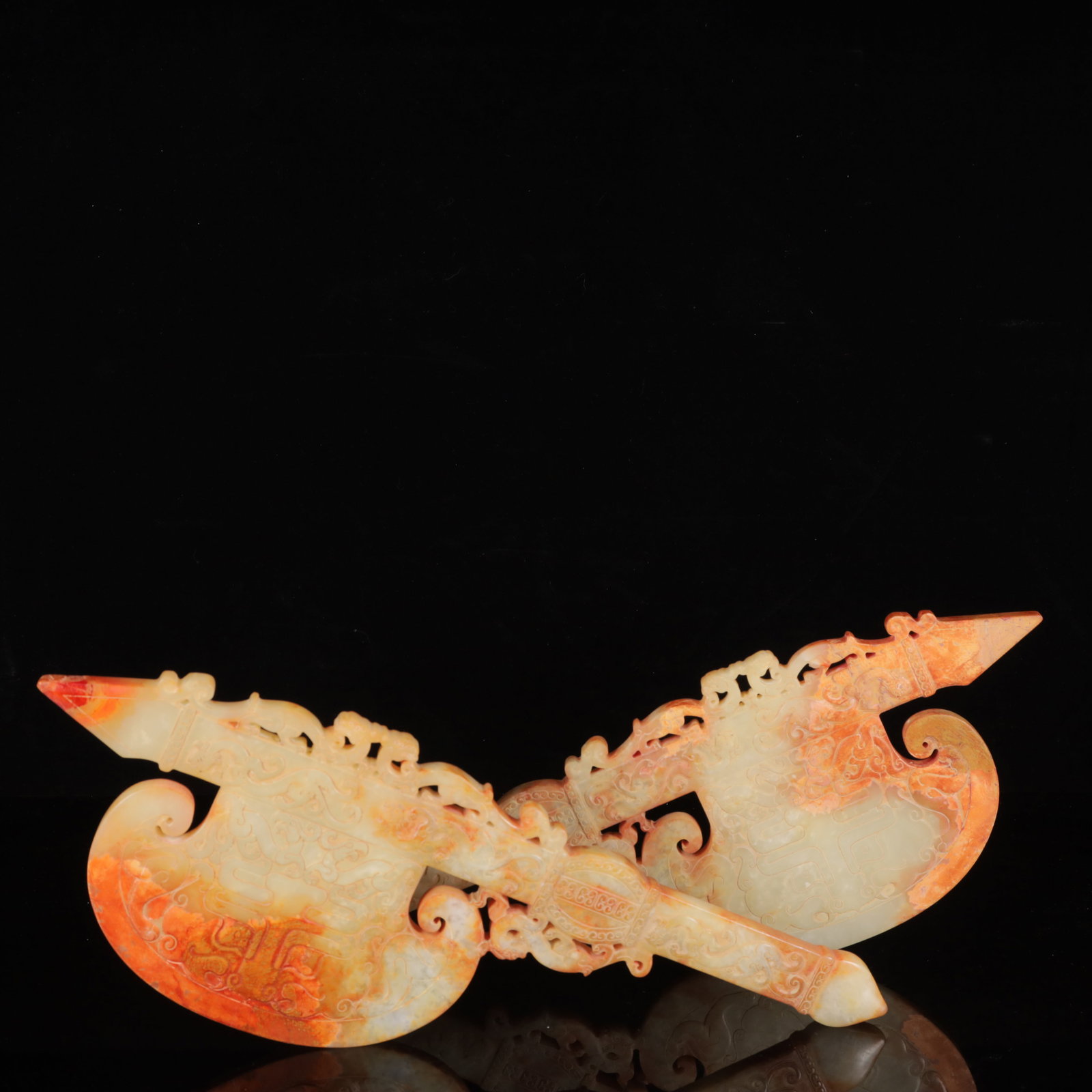 A Pair of Exquisite White Jade Beast-Face Pattern Swords: A Pair of Exquisite White Jade Beast-Face Pattern Swords,Qing Dynasty,China,Size:18.5inx0.8inx7.1in,Weight:2900g 一对白玉兽面纹刀,中国଀