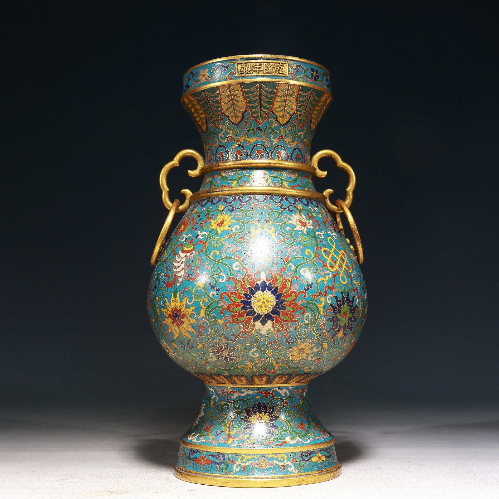 A Rare Cloisonne Lotus and Eight Treasures Pattern Double-Ears Vase: A Rare Cloisonne Lotus and Eight Treasures Pattern Double-Ears Vase,Qing Dynasty, China,Qianlong Four-character Mark,Size:6.3inx12.6in,Weight:2600g 景泰蓝缠枝莲