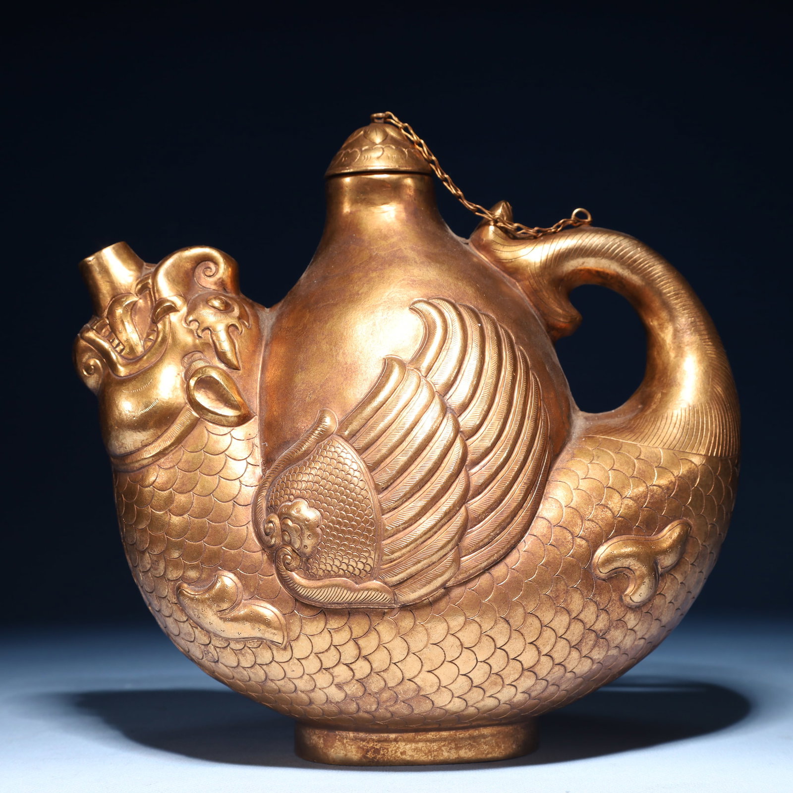An Exquisite Gilt Bronze Fish Pattern Pot: An Exquisite Gilt Bronze Fish Pattern Pot,Qing Dynasty,China,Size:9.1inx5.5inx9.4in,Weight:1500g 铜鎏金鱼纹壶,中国清代