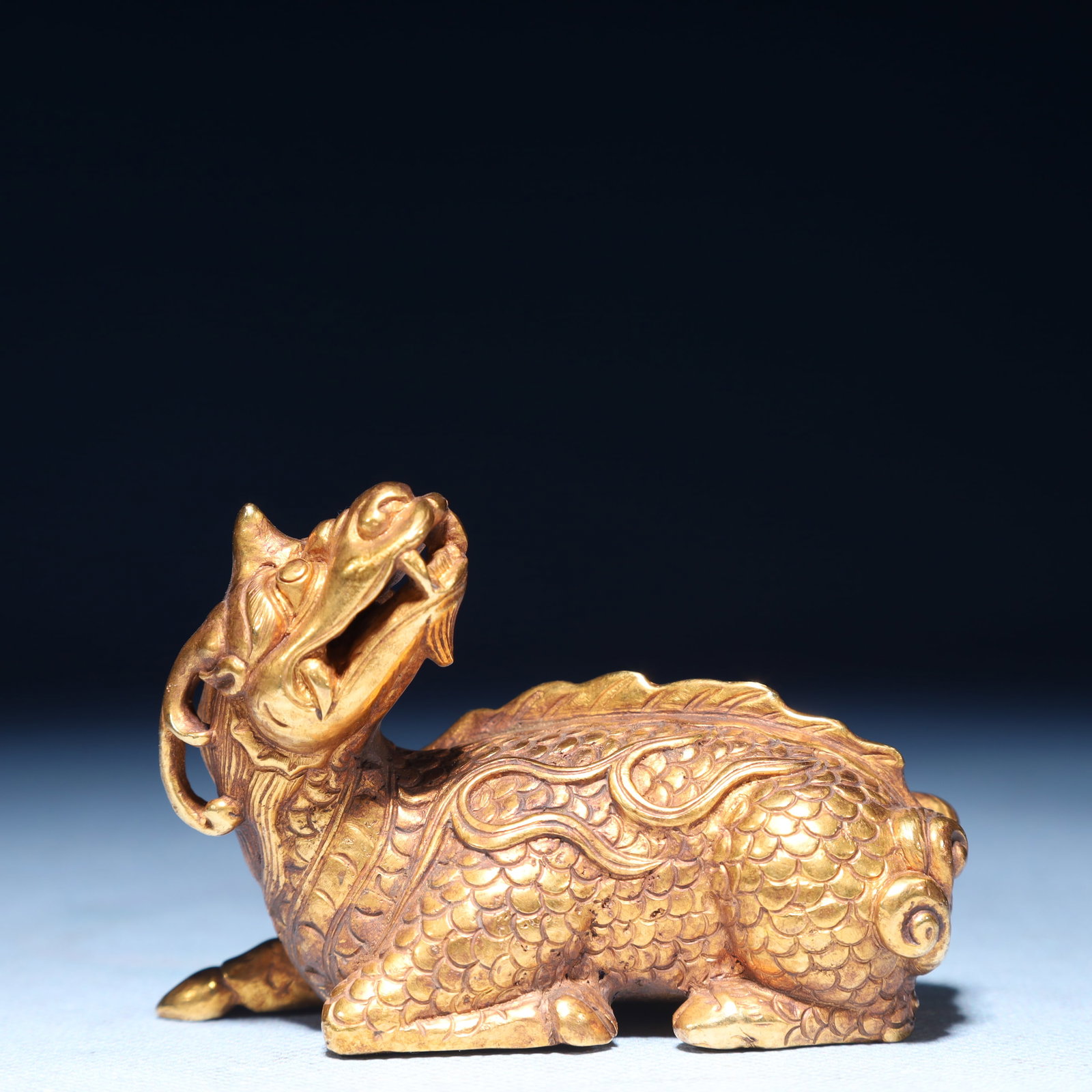 An Exquisite Gilt Bronze Unicorn Ornament: An Exquisite Gilt Bronze Unicorn Ornament,Qing Dynasty,China,Size:3.1inx1.6inx2.4in,Weight:500g 铜鎏金独角兽摆件,中国清代