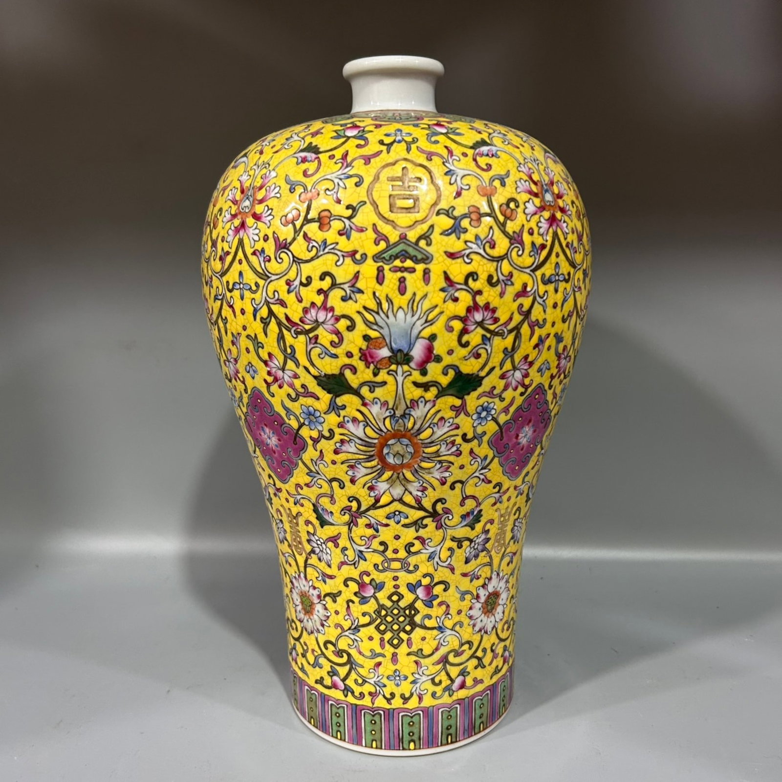 A Rare Yellow Ground Famille-Rose Lotus Pattern Vase: A Rare Yellow Ground Famille-Rose Lotus Pattern Vase,Qing Dynasty,China,Yongzheng Six-character Mark,Size:5.3inx11.8in