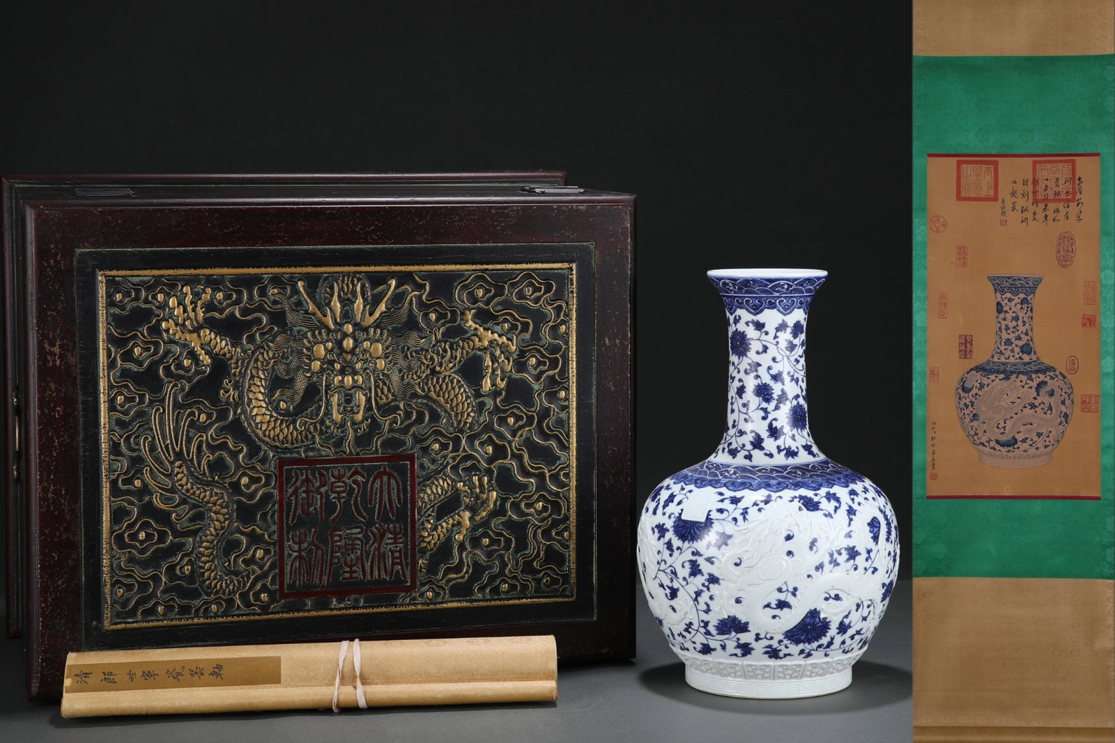 A Rare Blue and White Lotus and Dragon Pattern Vase,With Vertical Scroll Painting on Silk: A Rare Blue and White Lotus and Dragon Pattern Vase,With Vertical Scroll Painting on Silk,Qing Dynasty, China,Qianlong Six-character Mark,Size:13.4inx8.5in,(Without frame)24.4inx12.6in