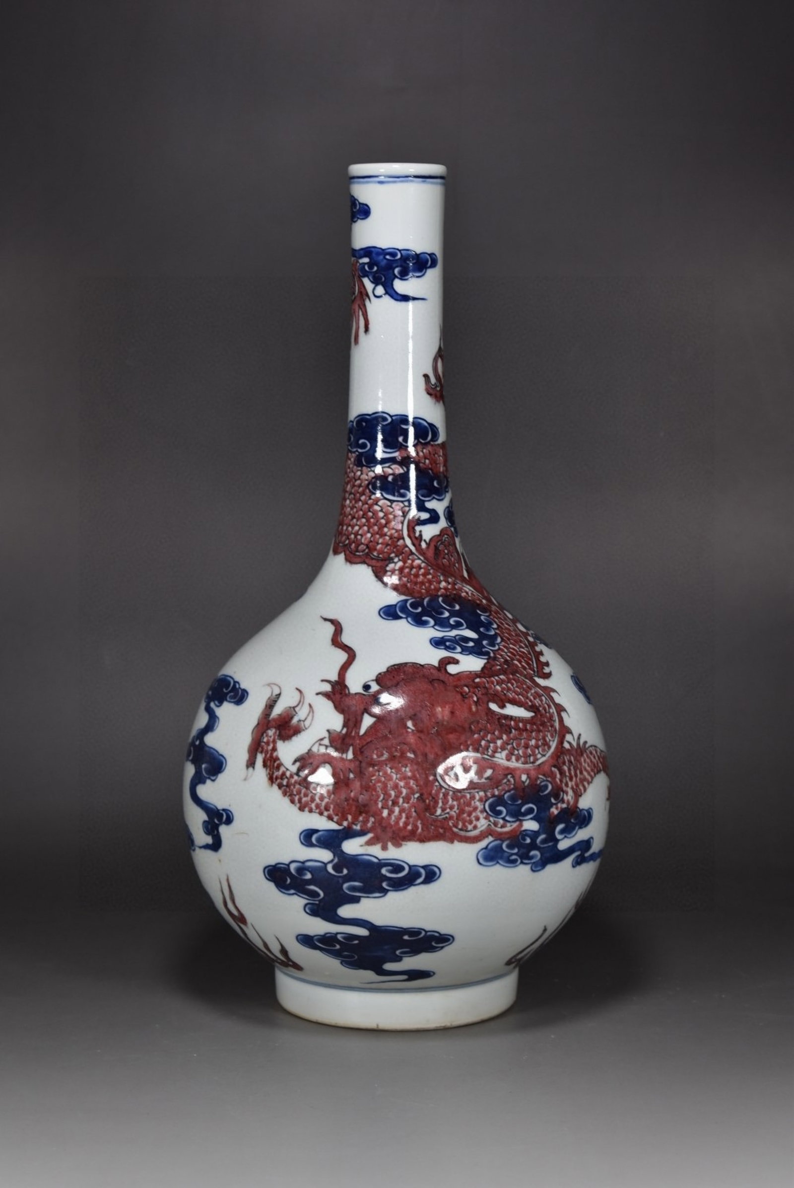 A Rare Blue and White Underglaze-Red Auspicious Cloud and Dragon Pattern Vase: A Rare Blue and White Underglaze-Red Auspicious Cloud and Dragon Pattern Vase,Qing Dynasty,China,Size:15inx8.7in 青花釉里红祥云龙纹瓶,ߑ
