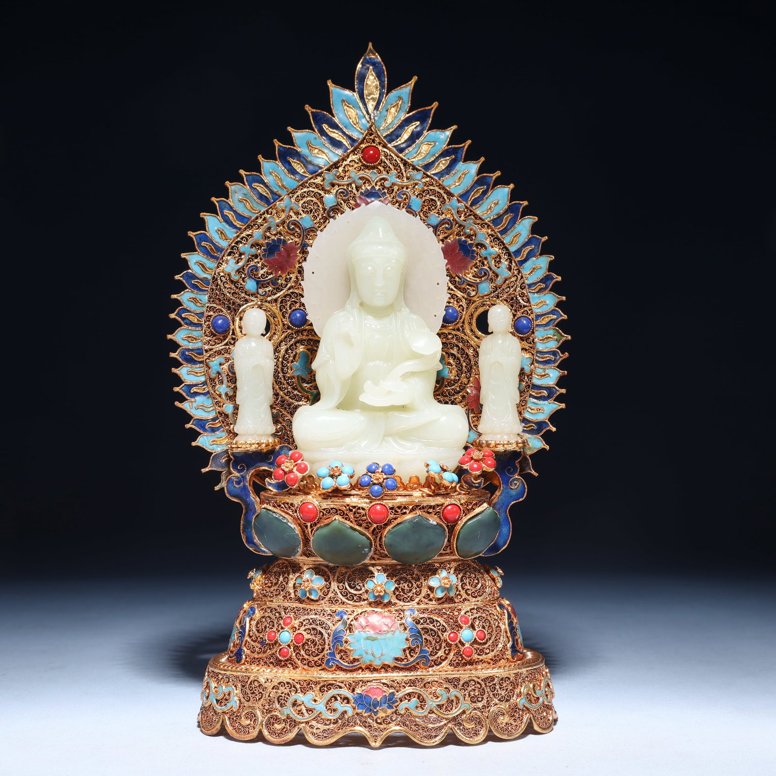 An Exquisite Filigree and Gilding Inlaid White Jade Buddha Statue, Inlaid Gems: An Exquisite Filigree and Gilding Inlaid White Jade Buddha Statue, Inlaid Gems, Qing Dynasty,China, Qianlong Four-character Mark, Size:5.9inx3.9inx11.8in,Weight:1100g 花丝鎏金&