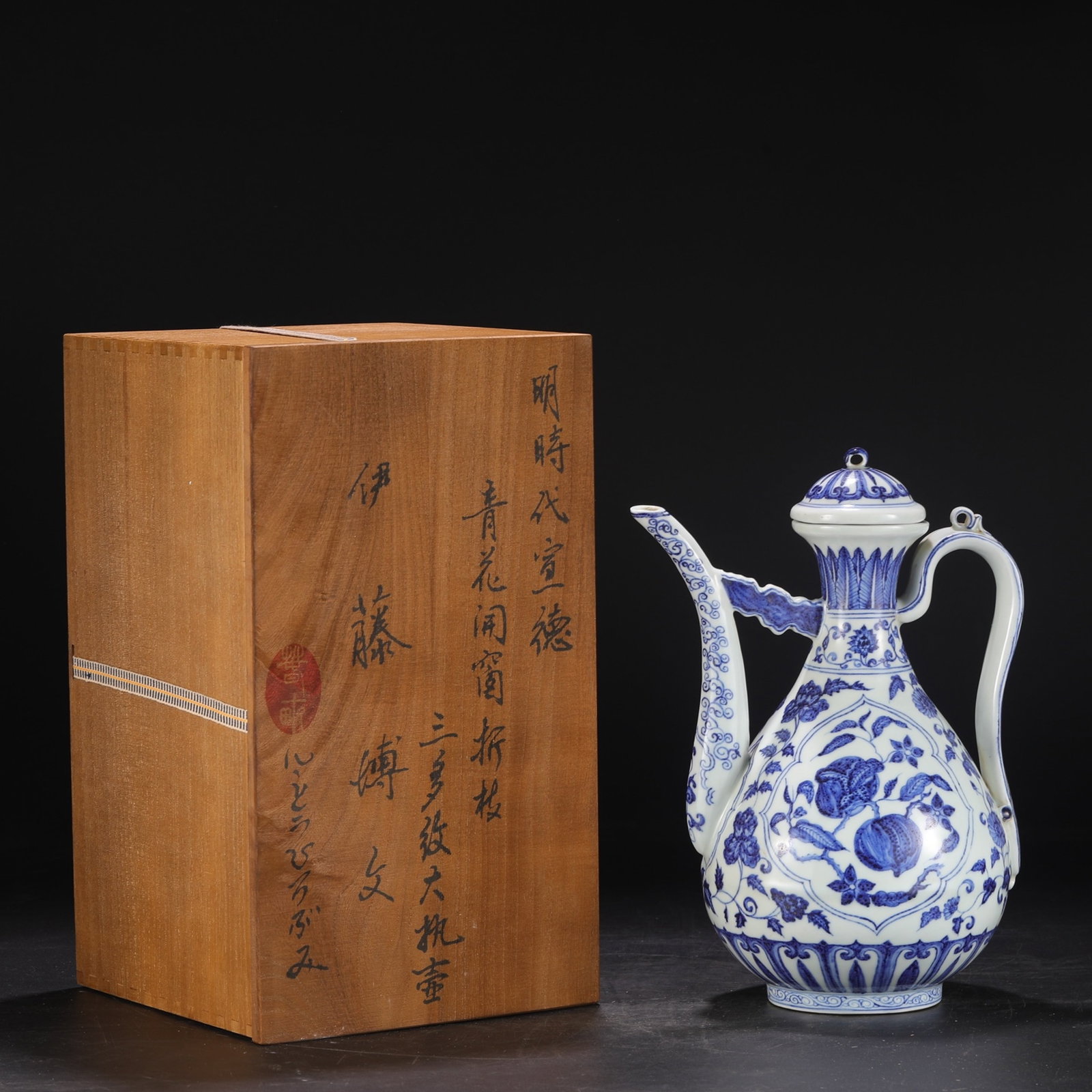 A Rare Blue and White Fruit Pattern Ewer: A Rare Blue and White Fruit Pattern Ewer,Ming Dynasty,China,Xuande Six-character Mark,Size:12.4inx3inx6.5in 青花果纹执壶,中国明代,宣&#
