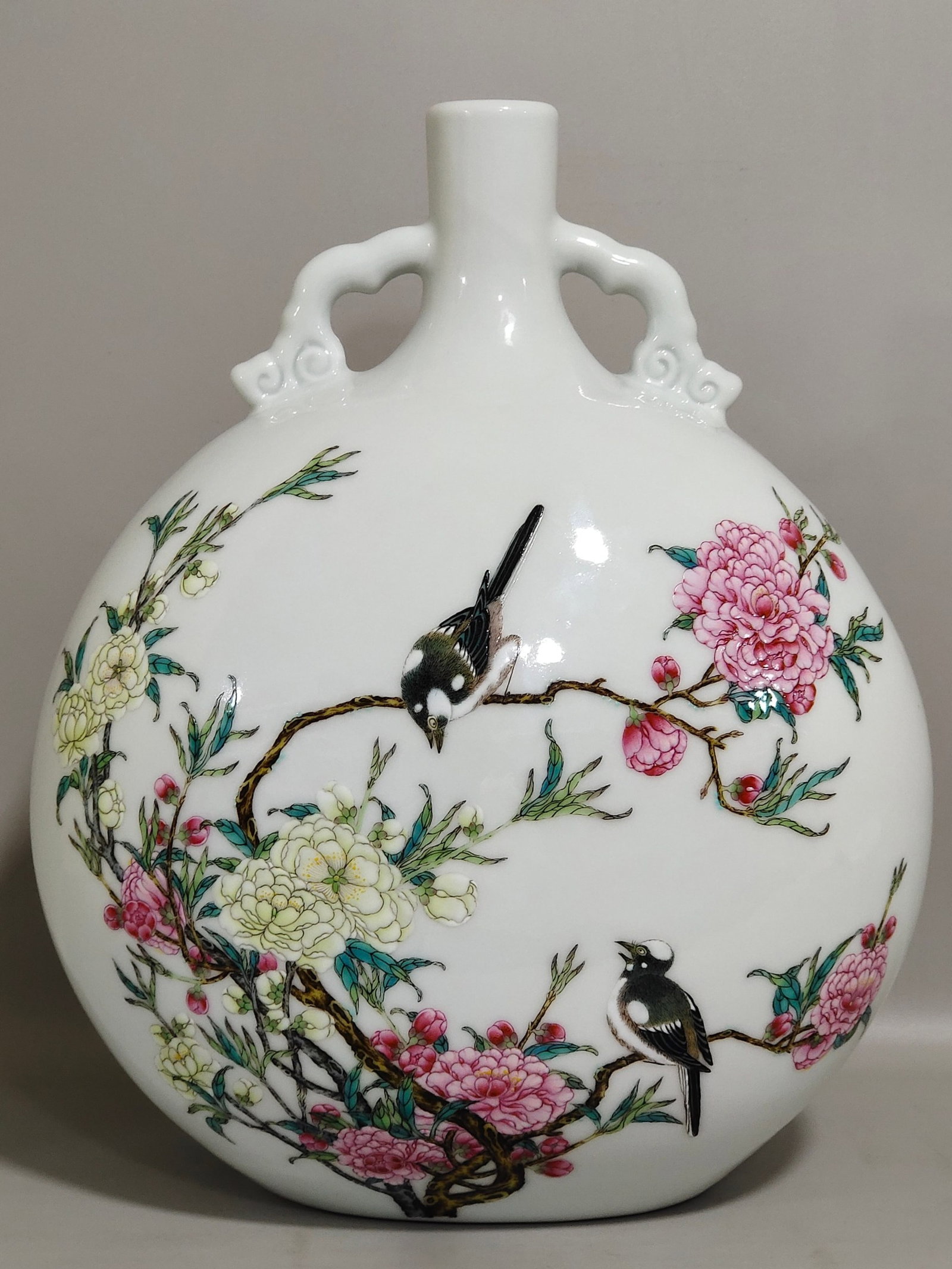 A Rare Famille-Rose Flower and Bird Pattern Double-Ears Vase: A Rare Famille-Rose Flower and Bird Pattern Double-Ears Vase,Qing Dynasty,China,Yongzheng Six-character Mark,Size:12.2inx9.1in 粉彩花鸟纹双耳瓶,中