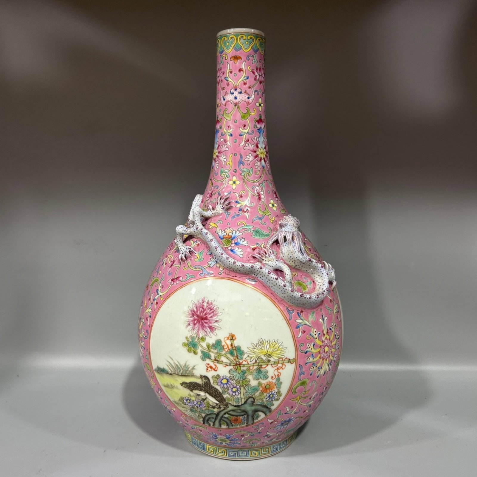 A Rare Pink Ground Famille-Rose Flower,Bird and Dragon Pattern Vase: A Rare Pink Ground Famille-Rose Flower,Bird and Dragon Pattern Vase,Qing Dynasty,China,With Mark,Size:5.9inx13.4in 粉地粉彩花鸟龙纹瓶,中