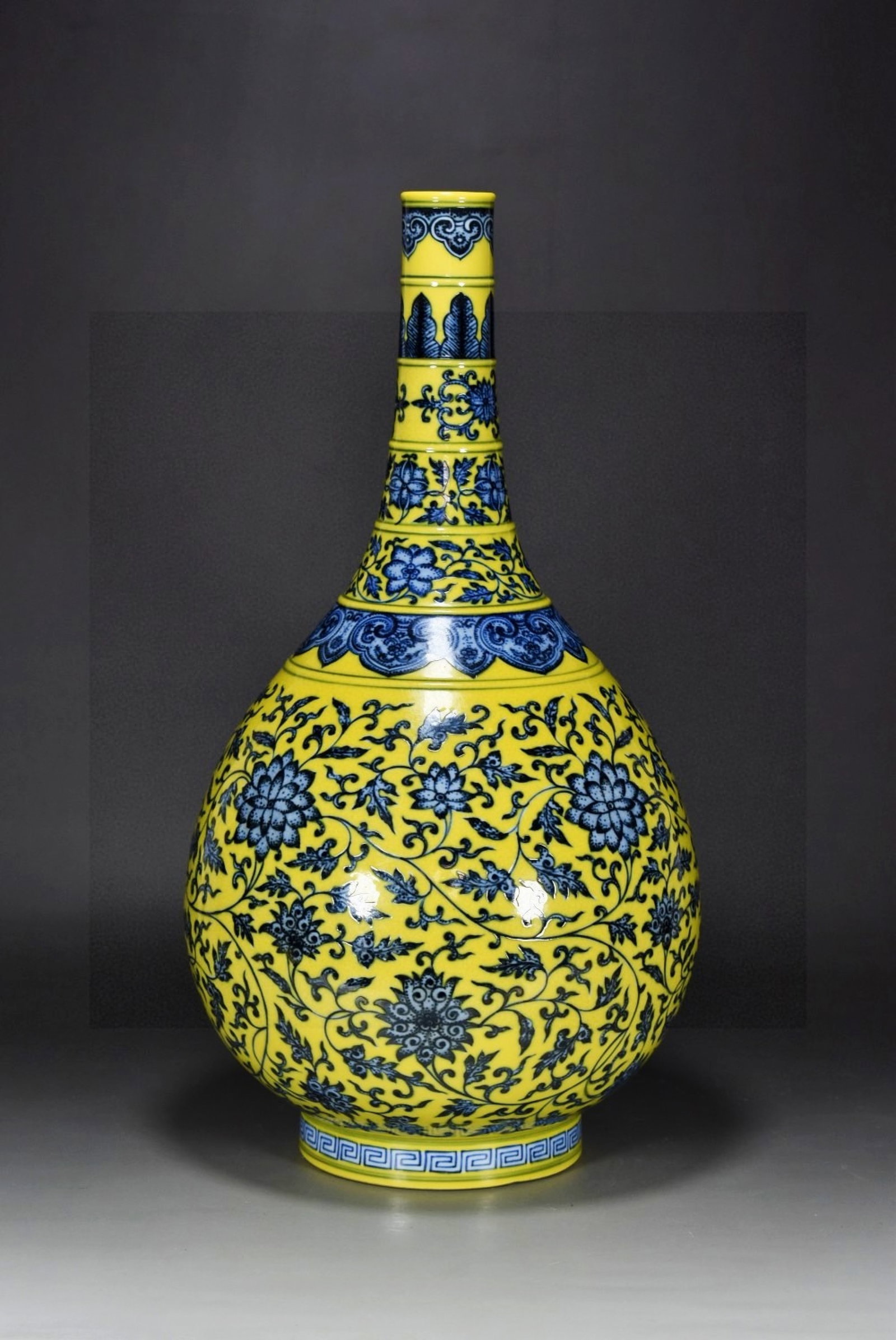 A Rare Guan yao Yellow Glazed Blue and White Lotus Pattern Vase: A Rare Guan yao Yellow Glazed Blue and White Lotus Pattern Vase,Qing Dynasty,China,Qianlong Six-character Mark,Size:15inx9.1in 官窑黄釉青花缠枝莲&
