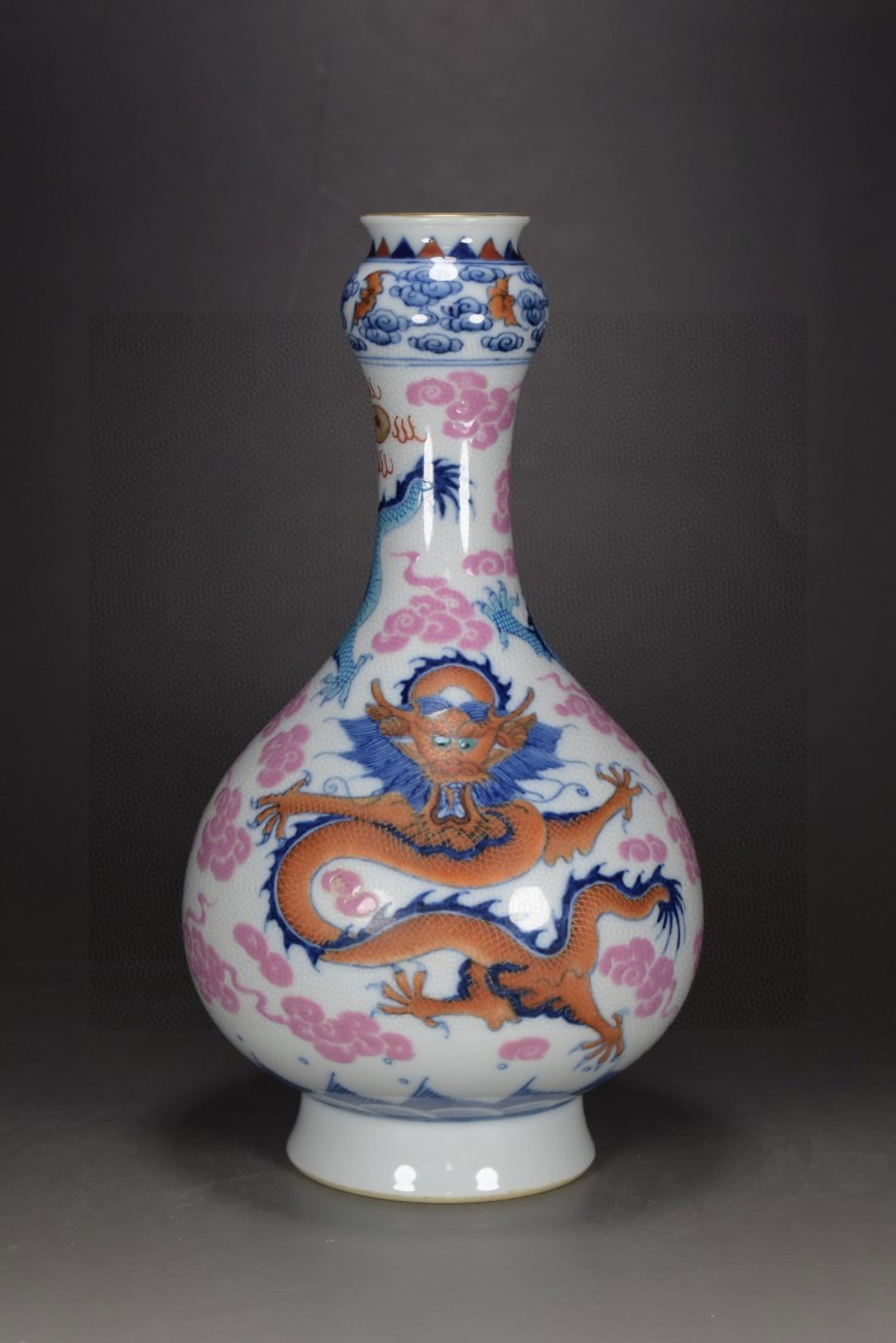 An Exquisite Blue and White Famille-Rose Auspicious Cloud and Dragon Pattern Vase: An Exquisite Blue and White Famille-Rose Auspicious Cloud and Dragon Pattern Vase,Qing Dynasty,China,Qianlong Six-character Mark,Size:11.4inx6.3in 青花粉彩祥云Ƙ