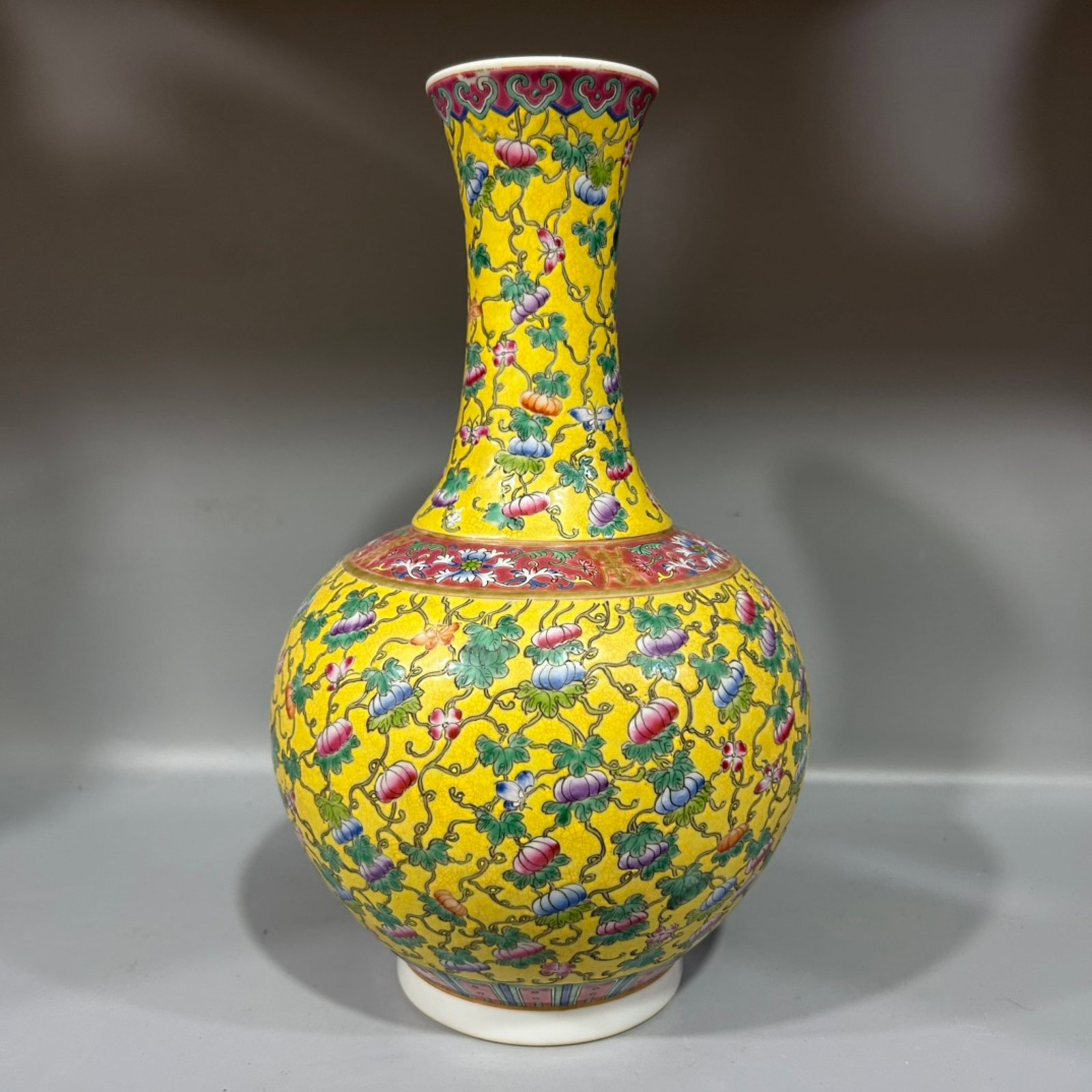 A Rare Yellow Ground Famille-Rose Pumpkin and Butterfly Pattern Vase: A Rare Yellow Ground Famille-Rose Pumpkin and Butterfly Pattern Vase,Qing Dynasty,China,Guangxu Six-character Mark,Size:6.3inx13in 黄地粉彩南瓜蝴蝶ń