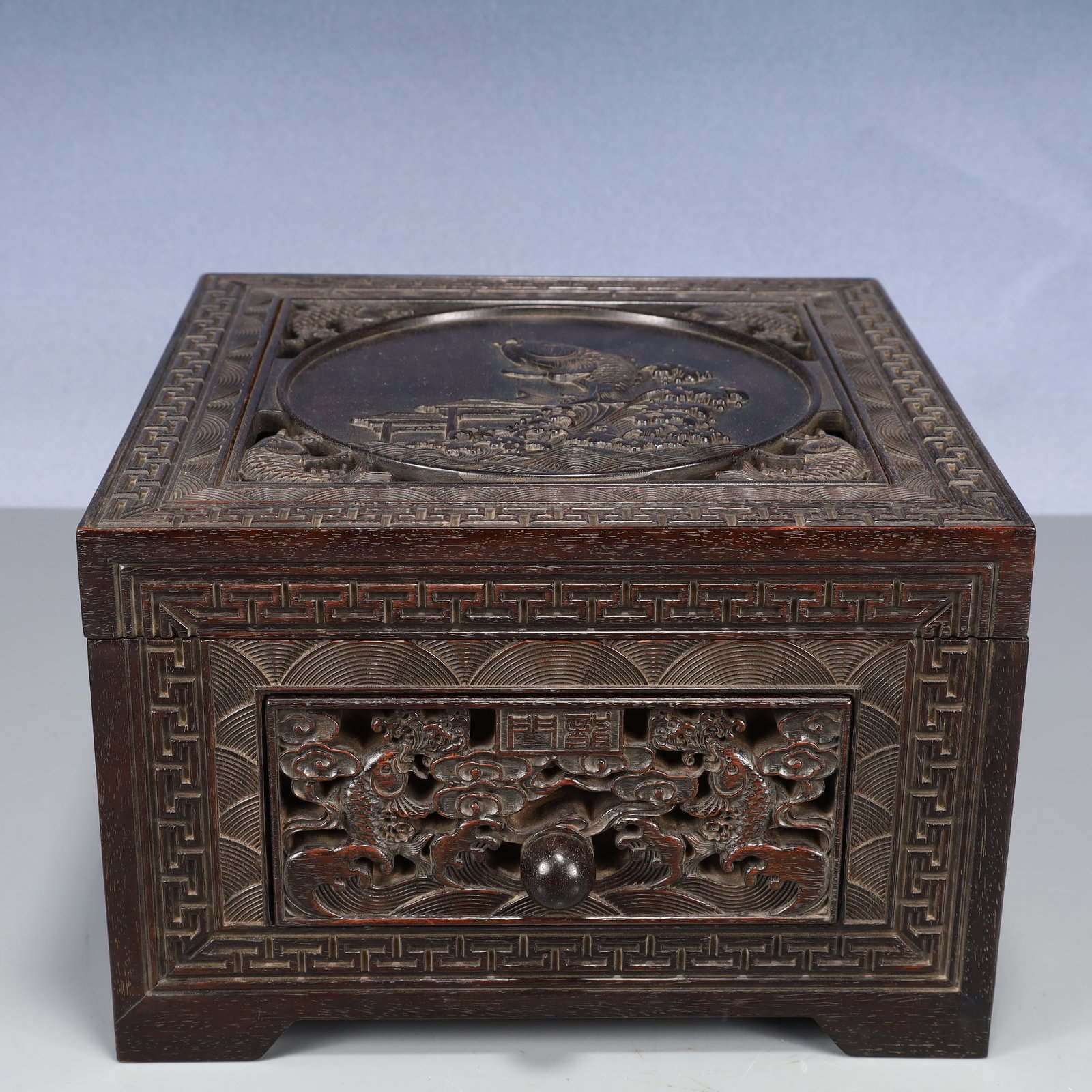 An Exquisite Zitanwood Hollow Seawater and Fish Pattern Cover Box: An Exquisite Zitanwood Hollow Seawater and Fish Pattern Cover Box,Qing Dynasty, China,Size:10.6inx7.1in,Weight:3850g 紫檀木镂空海水鱼纹盖