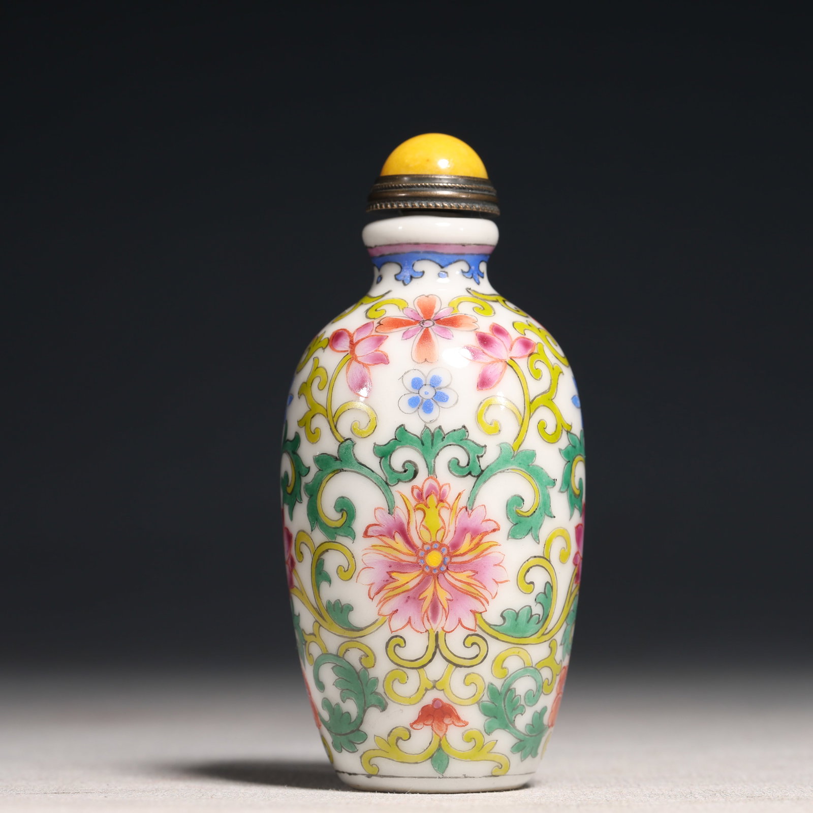 An Exquisite Painted Enamel Lotus Pattern Porcelain Snuff Bottle: An Exquisite Painted Enamel Lotus Pattern Porcelain Snuff Bottle,Qing Dynasty,China,Qianlong Four-character Mark,Size:1.4inx3.1in 瓷胎画珐琅彩缠枝ഫ
