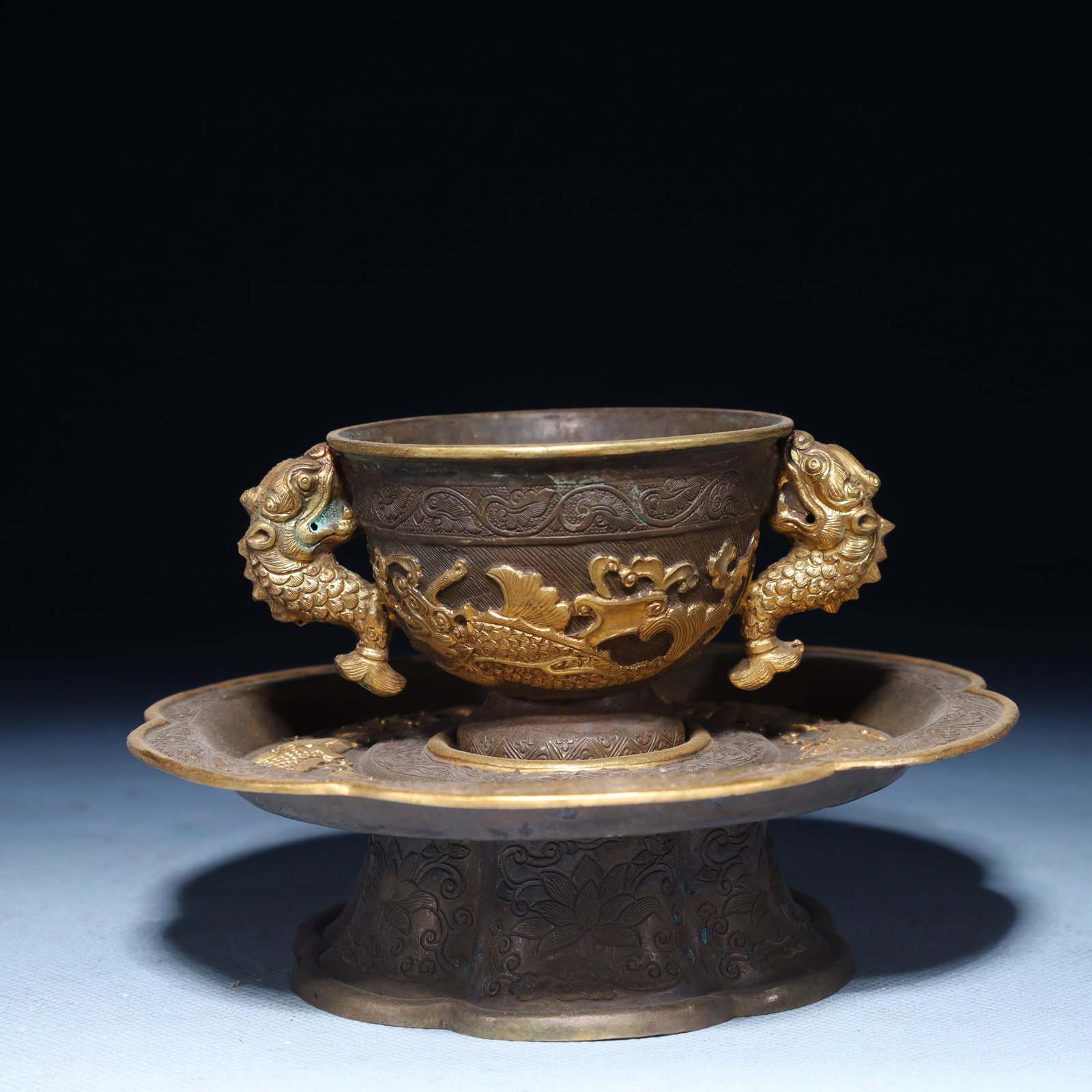 An Exquisite Silver-Gilt Bronze Fish Pattern Double-Ears Cup,with Plate: An Exquisite Silver-Gilt Bronze Fish Pattern Double-Ears Cup,with Plate,Qing Dynasty,China,Size:5.9inx3.7in,Weight:300g 铜鎏银鎏金鱼纹双耳杯