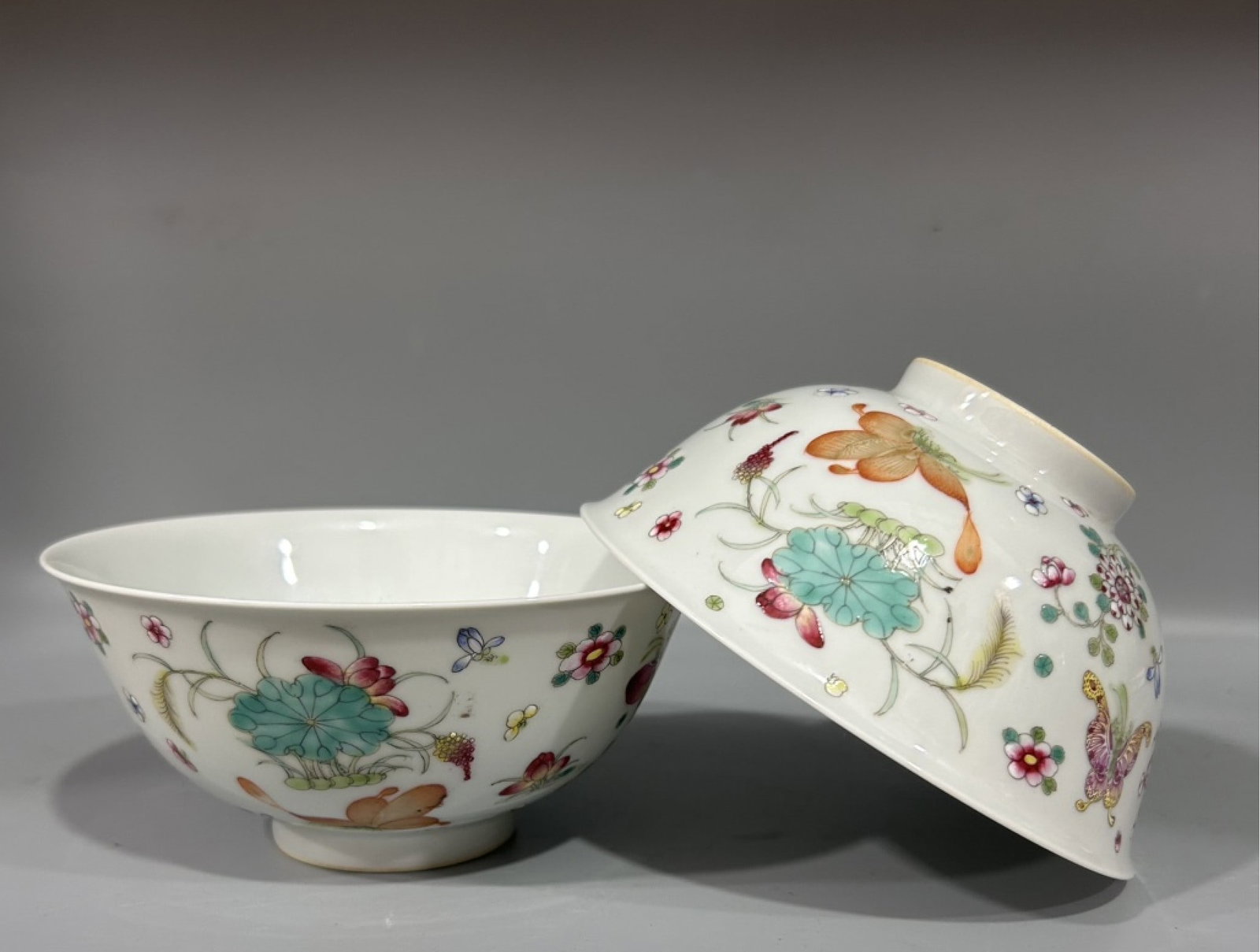 A Pair of Exquisite Famille-Rose Flower and Butterfly Pattern Bowls: A Pair of Exquisite Famille-Rose Flower and Butterfly Pattern Bowls,Qing Dynasty,China,Yongzheng Six-character Mark,Size:5.9inx2.8in 一对粉彩花卉蝴蝶