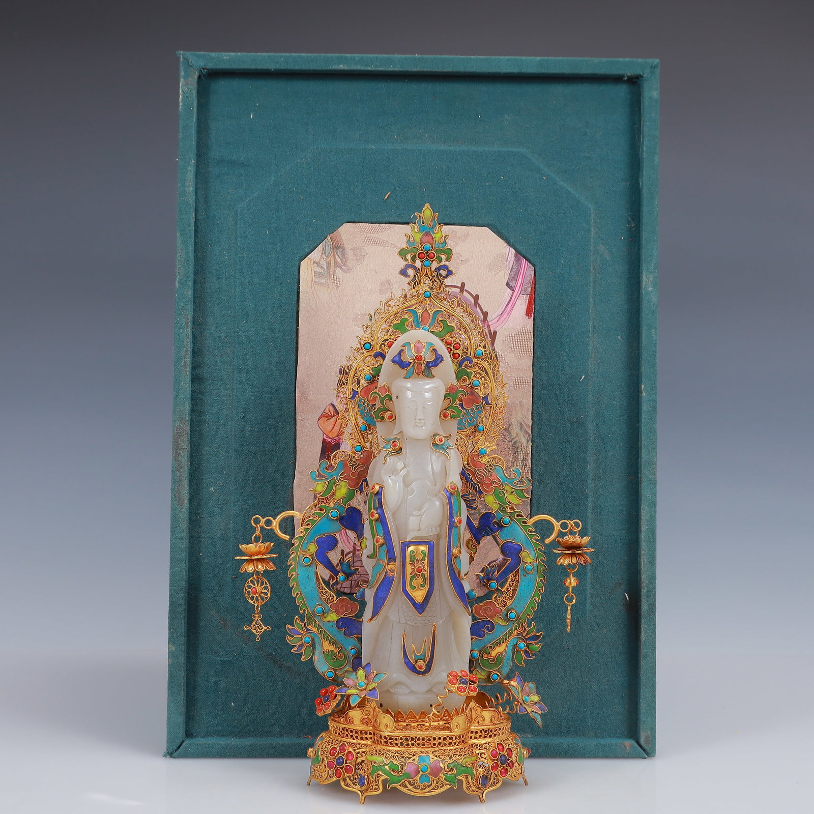 An Exquisite Filigree and Gilding Inlaid White Jade Statue of Avalokitesvara,Inlaid Turquoise: An Exquisite Filigree and Gilding Inlaid White Jade Statue of Avalokitesvara,Inlaid Turquoise,Qing Dynasty, China,Qianlong Four-Character Mark,Size:7.1inx3.1inx11.8in,(Box)15inx10.2inx6.7in,Weight:700