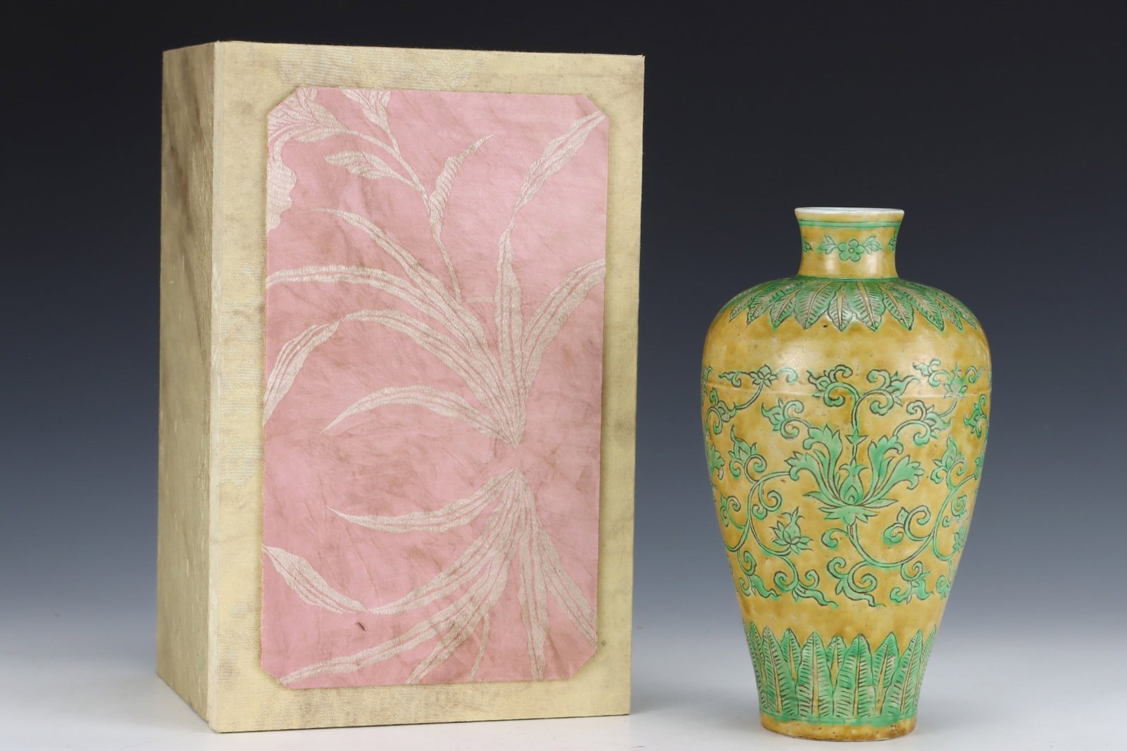 An Exquisite Yellow Ground Green Color Lotus Pattern Vase: An Exquisite Yellow Ground Green Color Lotus Pattern Vase,Ming Dynasty,China,Xuande Six-character Mark,Size:10.1inx5.6in 黄地绿彩缠枝莲纹瓶,ߑ