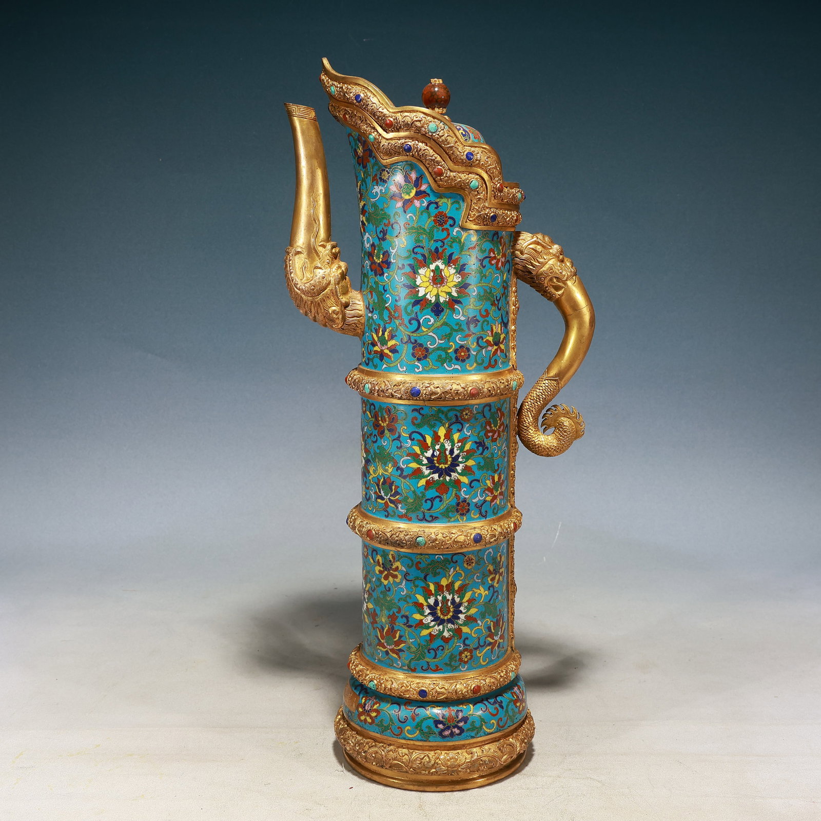 A Huge Cloisonne Lotus Pattern Beast-head Ewer,Inlaid Gems: A Huge Cloisonne Lotus Pattern Beast-head Ewer,Inlaid Gems,Qing Dynasty, China,Qianlong Six-character Mark,Size:9.4inx5.5inx20.5in,Weight:4350g