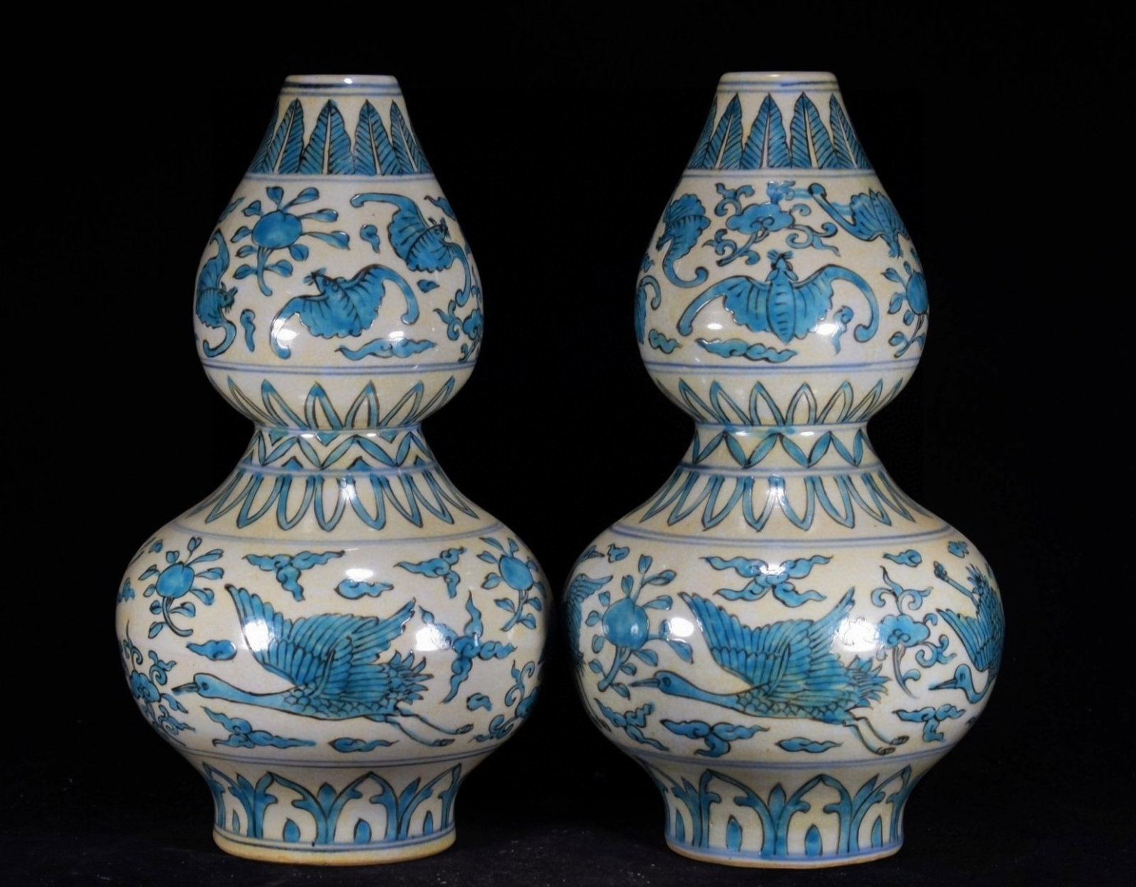 A Rare Blue Glazed Auspicious Cloud,Bats and Crane Pattern Gourd Vase: A Rare Blue Glazed Auspicious Cloud,Bats and Crane Pattern Gourd Vase,Ming Dynasty,China,Wanli Four-character Mark,Size:14.2inx8.7in 蓝釉祥云蝙蝠鹤纹