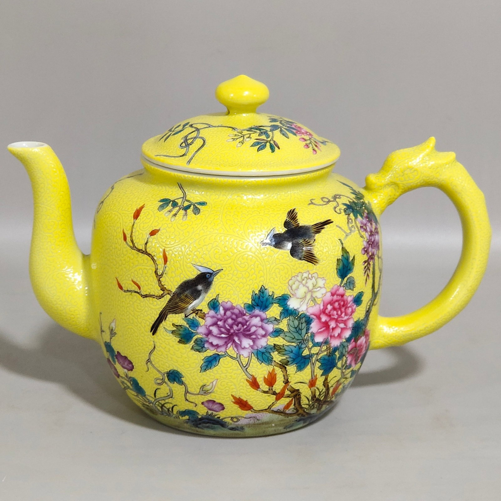 An Exquisite Yellow Glazed Famille-Rose Flower and Bird Pattern Teapot,With Poem: An Exquisite Yellow Glazed Famille-Rose Flower and Bird Pattern Teapot,With Poem,Qing Dynasty,China,Qianlong Six-character Mark,Size:4.6inx6.6in 黄釉粉彩花鸟纹