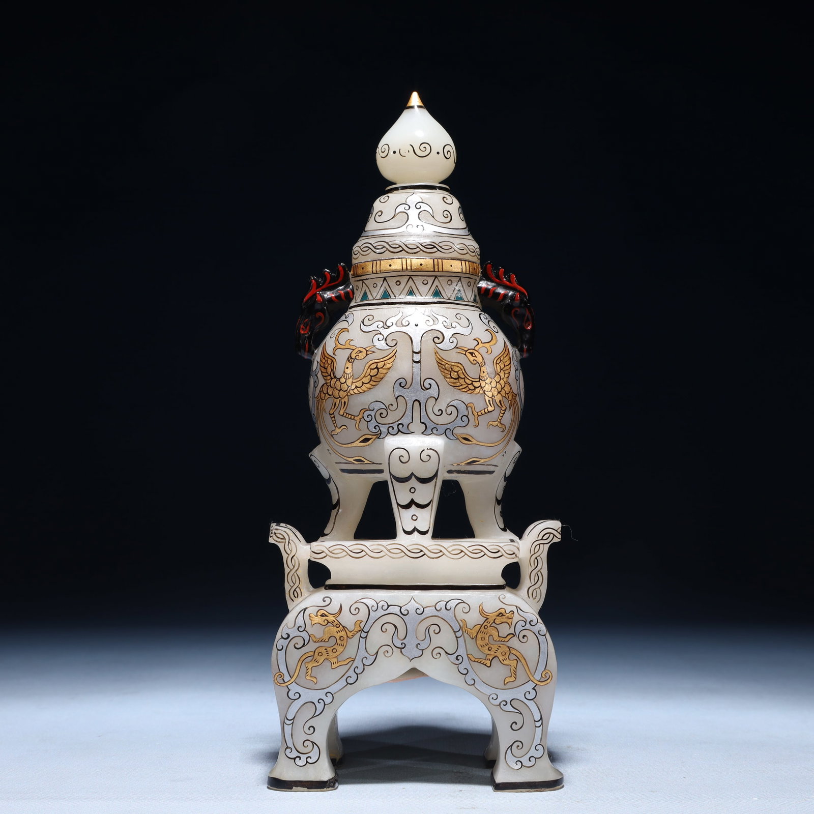 An Exquisite White Jade Inlaid Gold and Silver Double-Ears and Tripod Censer: An Exquisite White Jade Inlaid Gold and Silver Double-Ears and Tripod Censer, Qing Dynasty,China, Size:3.9inx2.4inx9.4in,Weight:1250g 白玉错金银双耳三&#