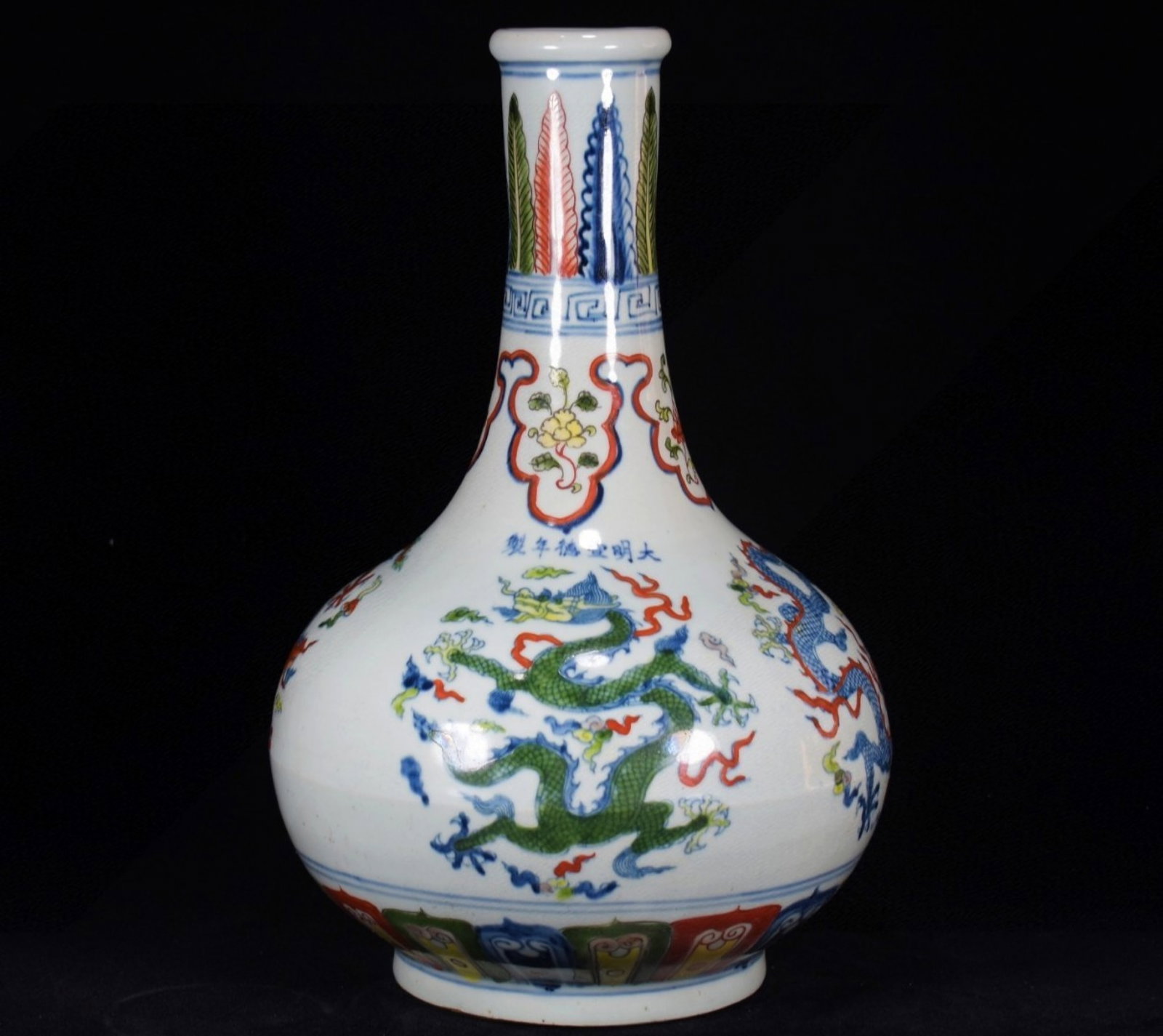 A Rare Doucai Auspicious Cloud and Dragon Pattern Vase: A Rare Doucai Auspicious Cloud and Dragon Pattern Vase,Ming Dynasty,China,Xuande Six-character Mark,Size:13.8inx8.7in 斗彩祥云龙纹瓶,中国明&